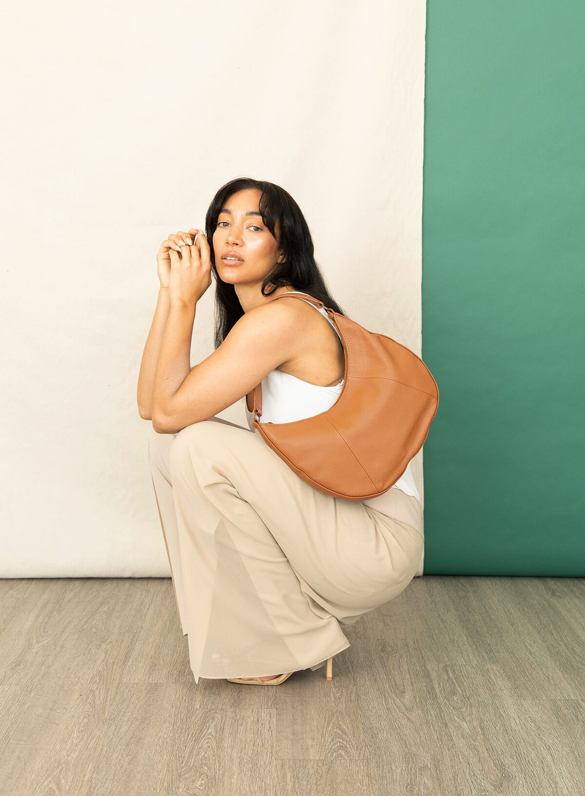 saddle shoulder bag from womens bags in honey for fall showcasing side view.