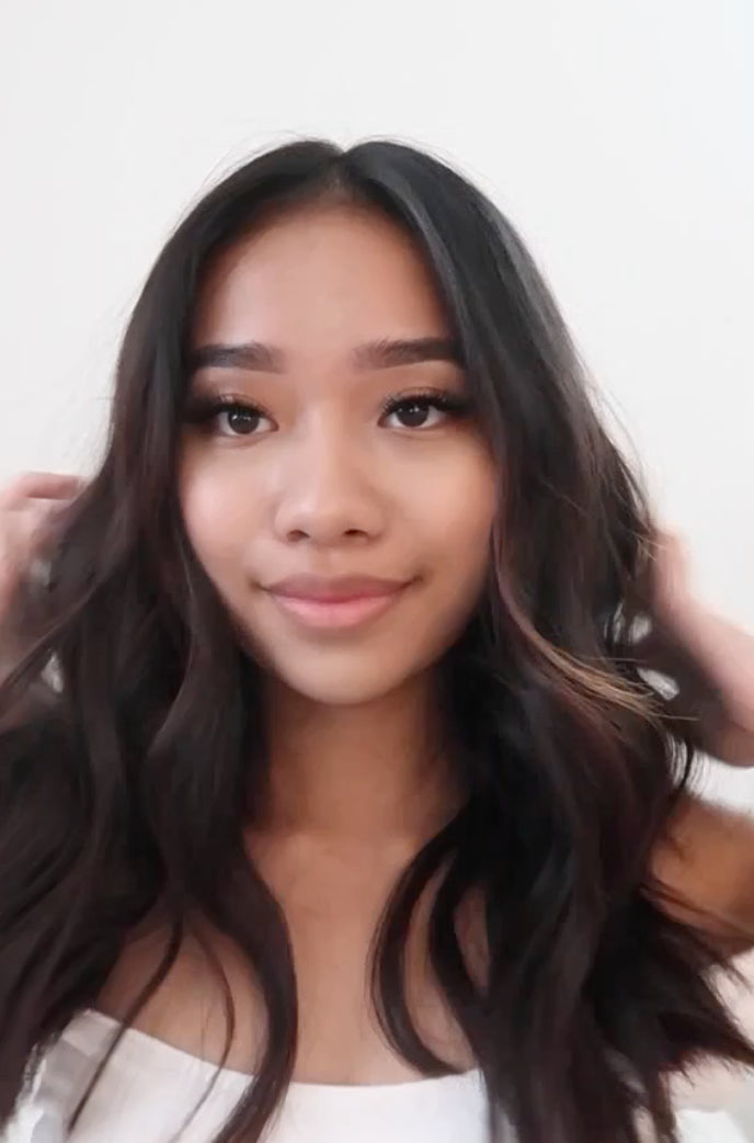 Patrizzle touching shiny hair