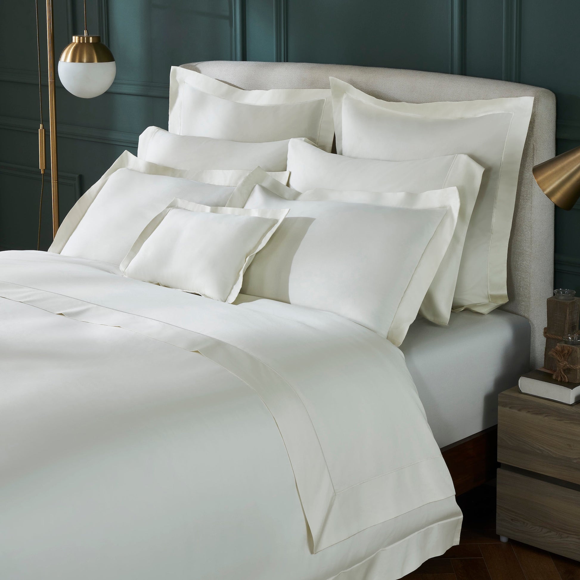 DT-064-10692_2|Close-up of elegant cream duvet cover and matching shams, luxurious bedding for a chic bedroom aesthetic.