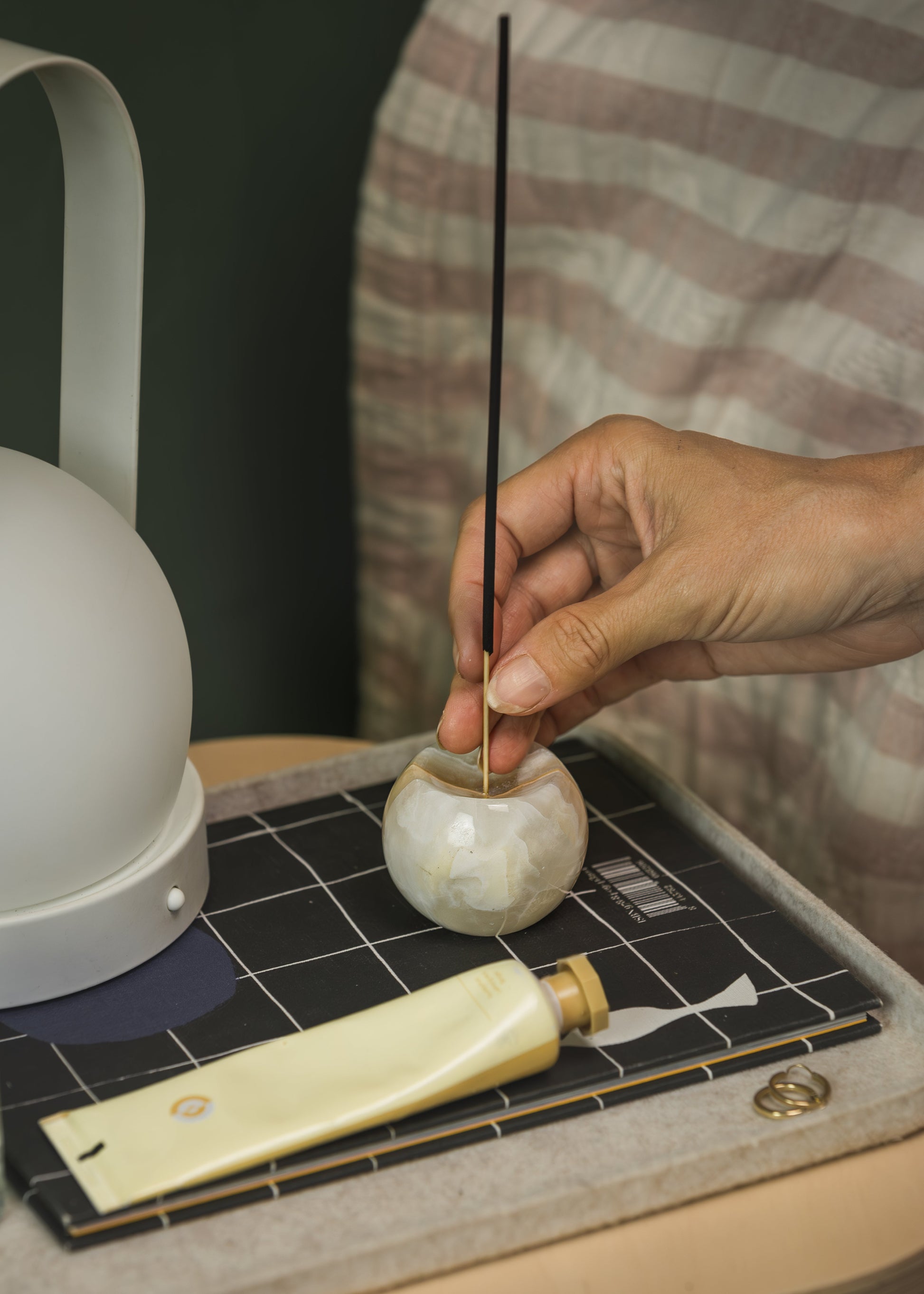 Gemstone sphere incense holder in Onyx Crema - develop relaxing routines charged wtih gemstone energies by adding special elements like these to home.