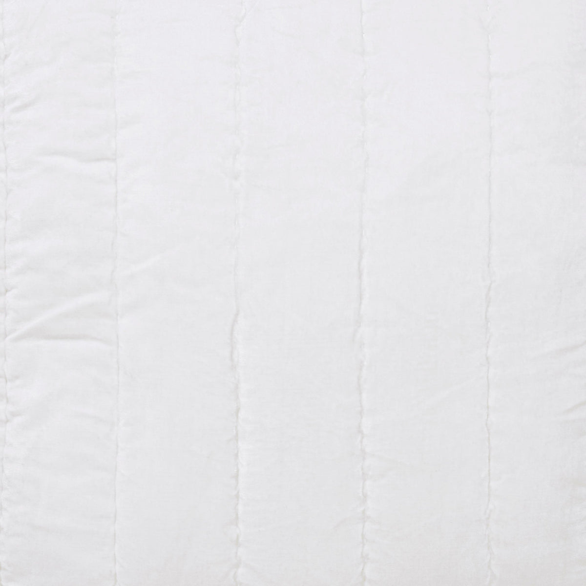 QT-337-11096_6|Clean white quilt featuring subtle vertical channel stitching, offering a minimalist yet cozy texture for bedding.