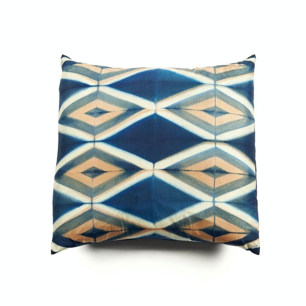 Tisa Indigo handcrafted shibori print decorative silk pillow featuring unique geometric patterns in luxurious silk fabric.