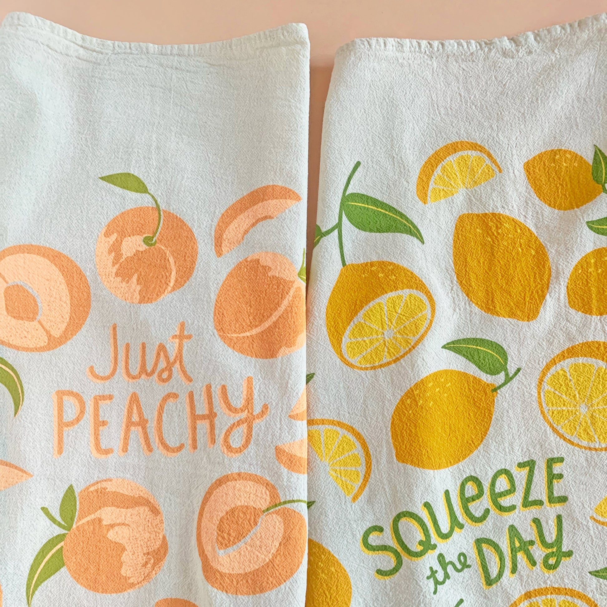 Peach and lemons dish towels folded together