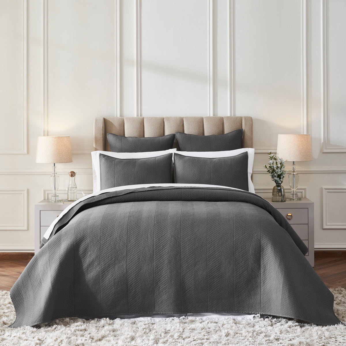 CL-263-11096_1|Sophisticated charcoal grey quilted coverlet with a stylish herringbone pattern on a bed in an elegant bedroom setting.