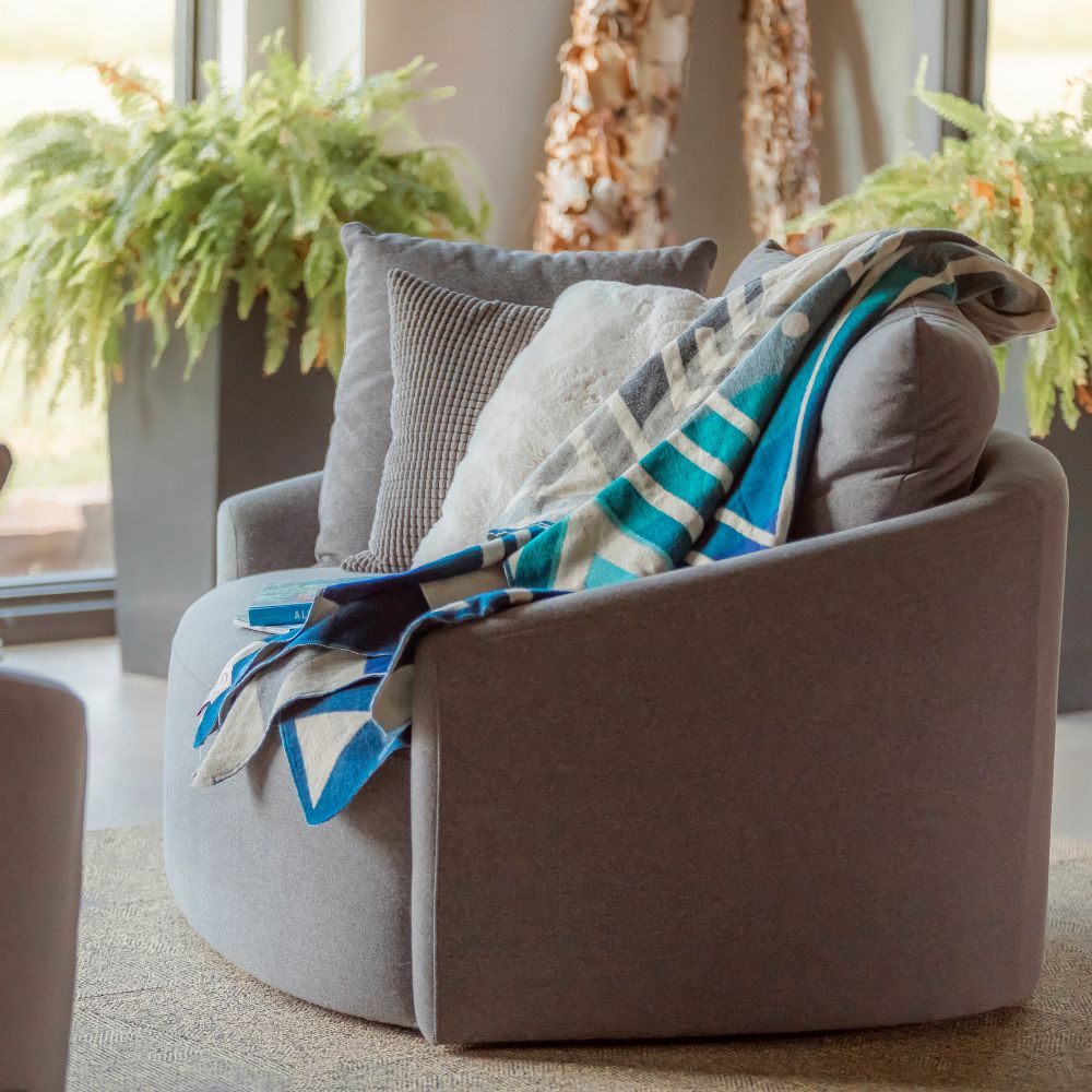 Artisanal blue woven throw on chair