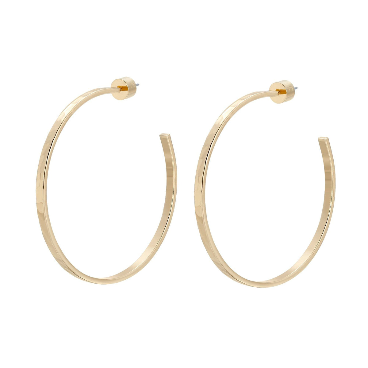 Gold hammered hoop earrings showing off trendy 2-inch style perfect for any outfit