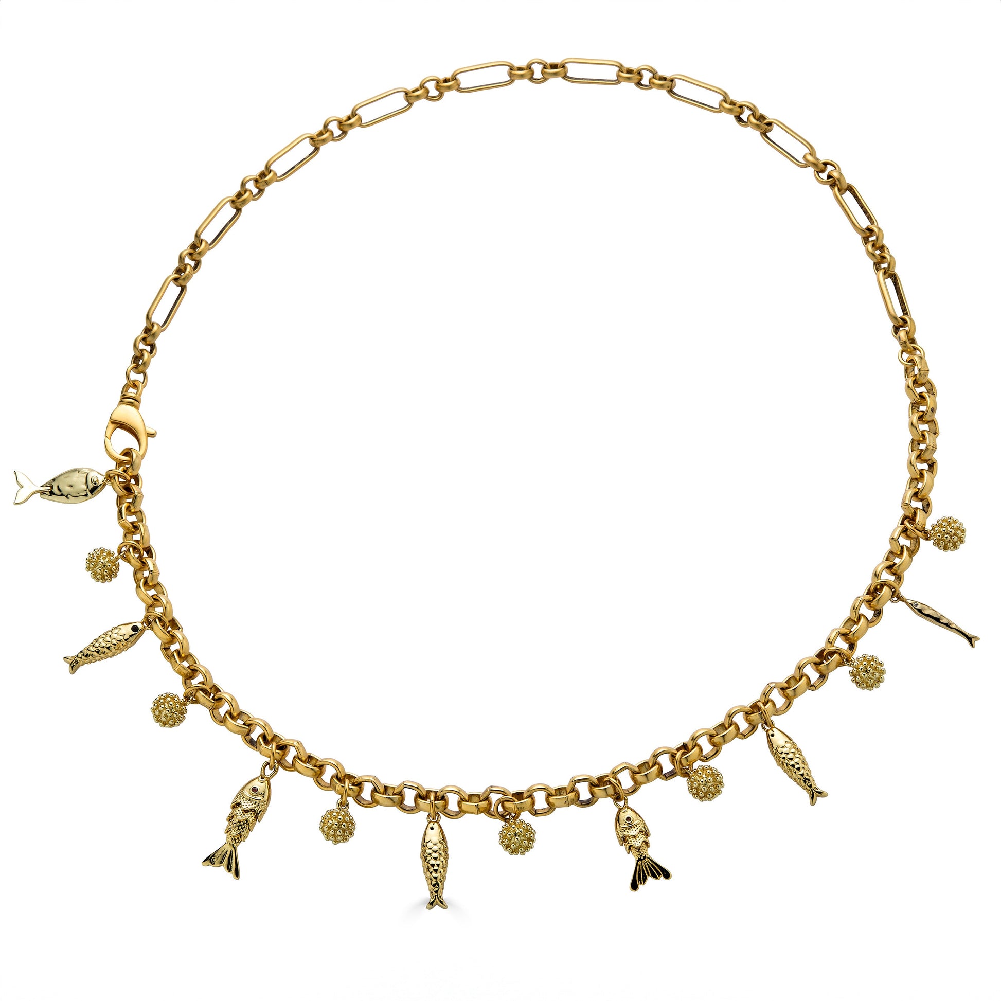 Convertible gold fish charm necklace with dangling fish and textured bead charms worn as both a lariat and classic chain necklace.