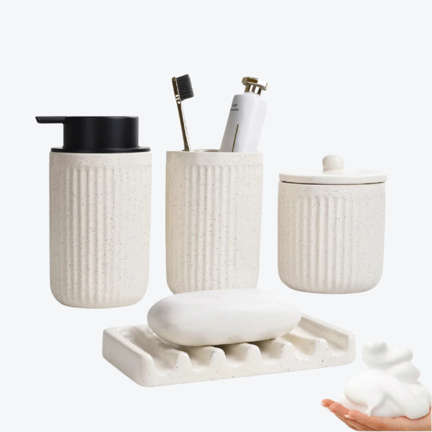 Black bathroom accessory set with containers, soap dish, and toothbrush holder on a white background.