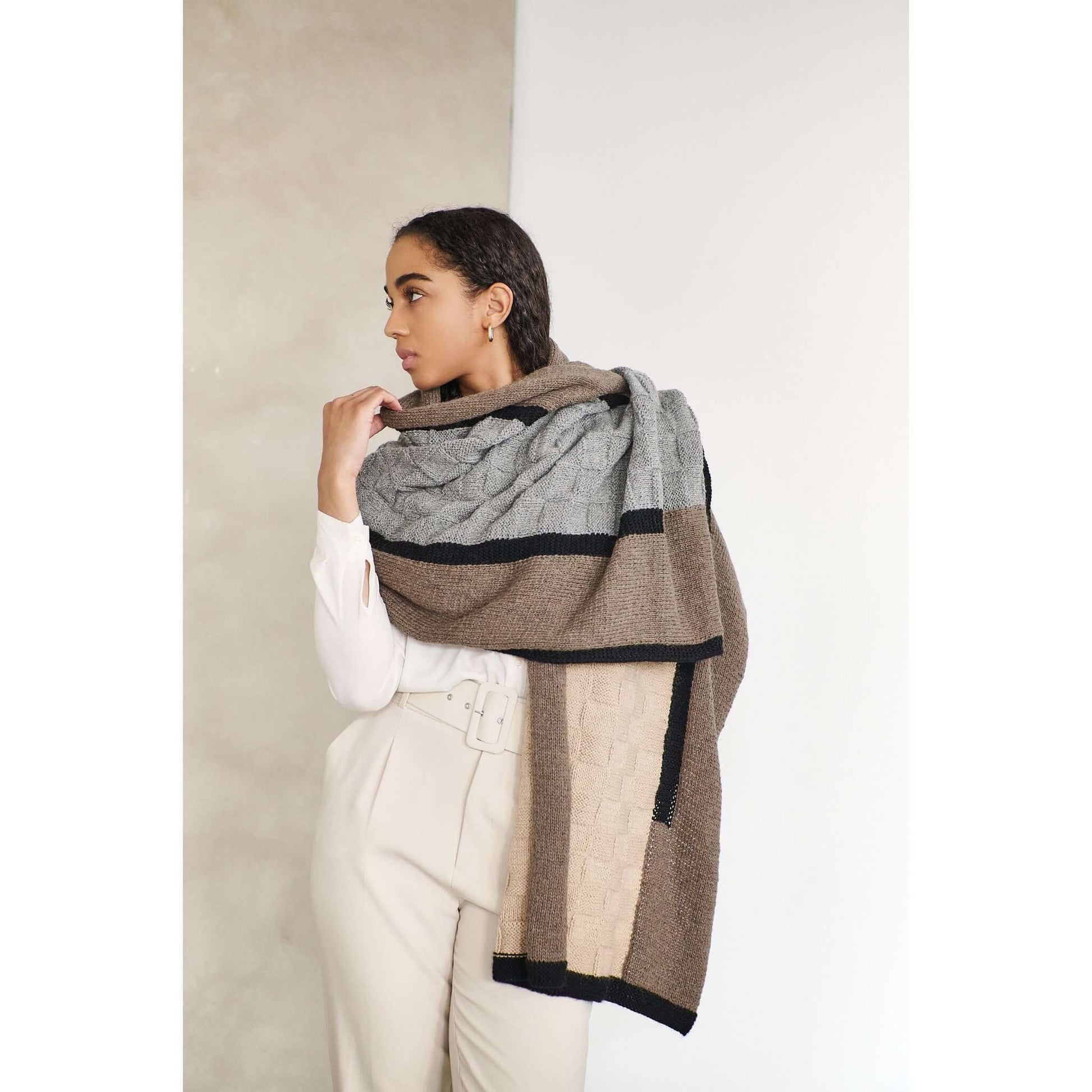 Muhu Brown Gray Hand Knitted Peruvian Alpaca Blanket / Large Plush Scarf wrapped around a model showcasing its texture and design.