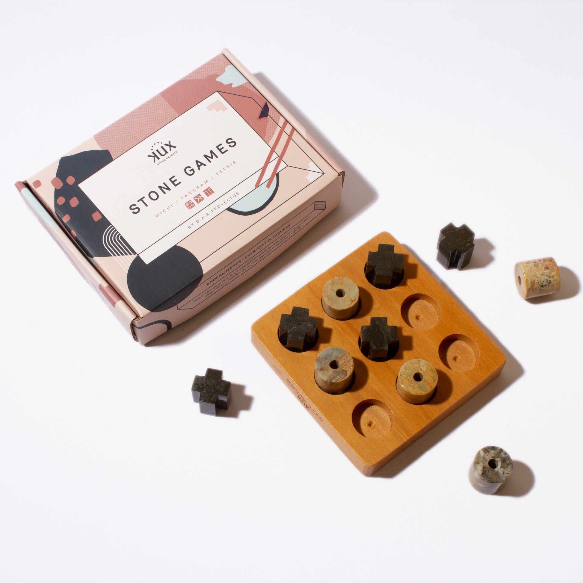 Packaging view of the natural stone Tic Tac Toe game emphasizing a premium presentation on a white background.