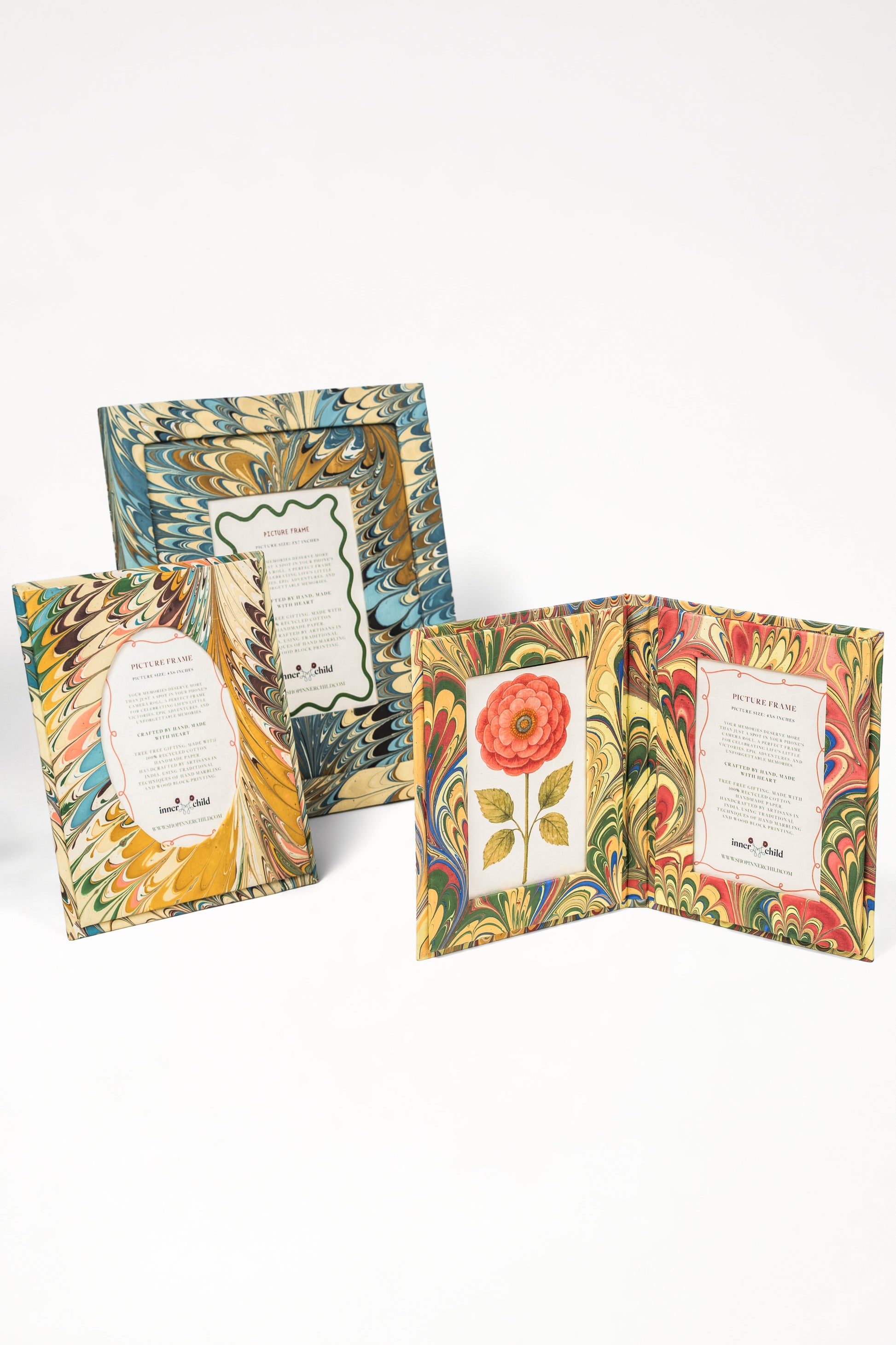 Collection of hand-marbled flatiron feathers picture frames with oval openings