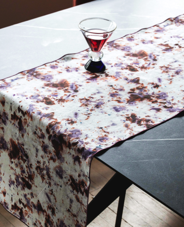 Rose Marble linen table runner styled on dinner table with candles - Goldie Home