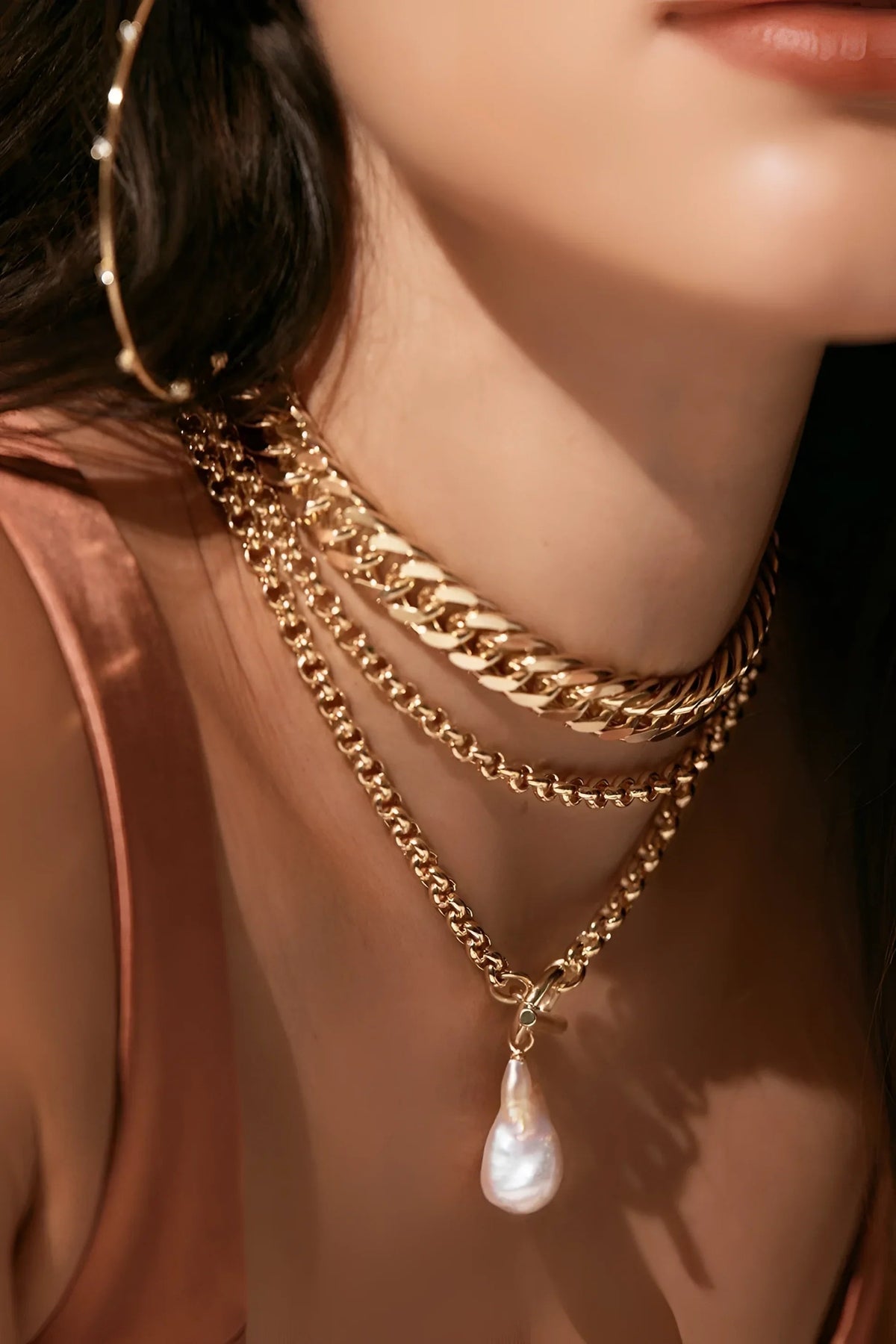 Layered gold chain necklaces with pearl pendant from Micro Royal Toggle & XL Baroque Pearl Pendant Necklace