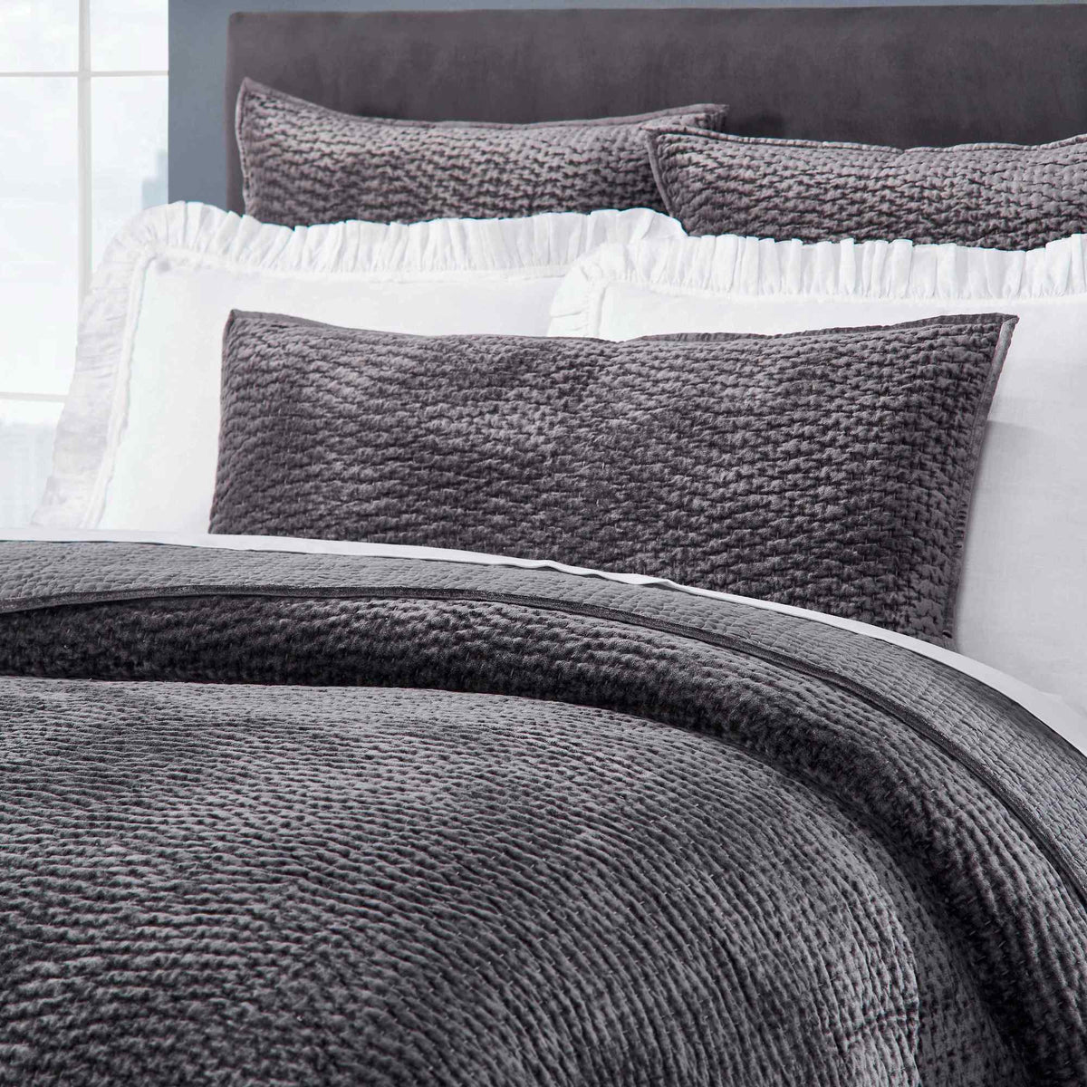 CL-184-9496_2|Luxurious dark gray textured coverlet gracing a contemporary bed, enhancing bedroom decor with rich color.