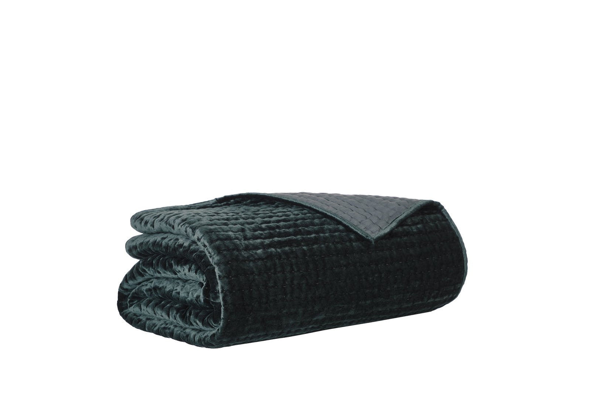 QT-363-9496_7|Dark green velvet quilted bedspread, neatly rolled, showcasing its textured design and a glimpse of the reverse side.