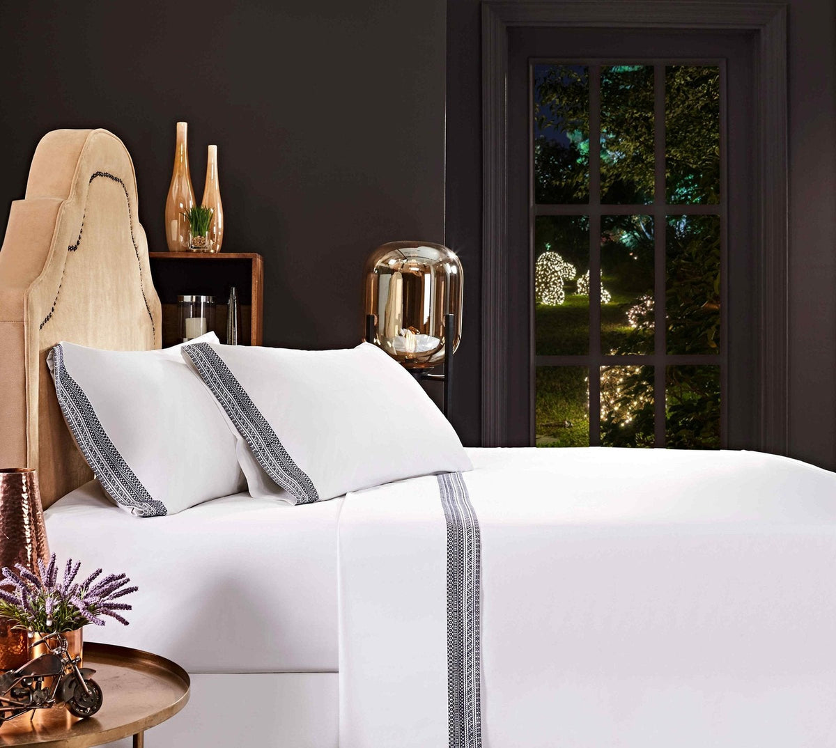 QSS-503-6080_4|Elegant white 100% cotton sheet set with navy blue embroidered border, enhancing a luxurious bedroom decor.