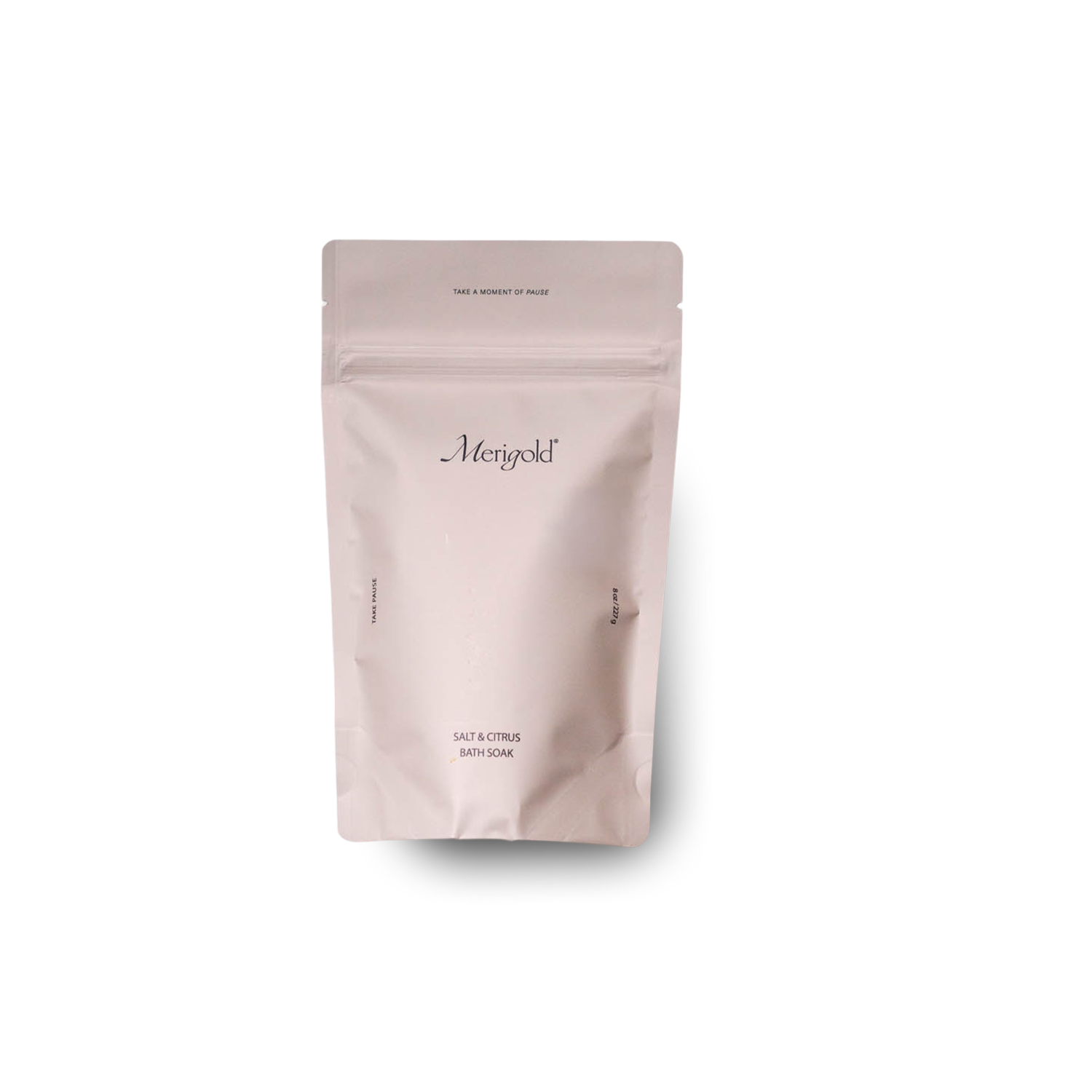 Merigold Salt & Citrus Bath Soak in minimalist light pink resealable bag with subtle branding and clean, modern label design, showcasing ingredients like Himalayan salt, Dead Sea salt, and organic orange peel, photographed on white background.