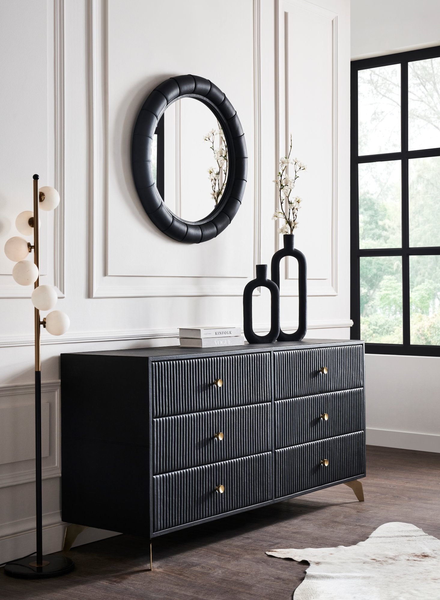 FN-5202-642033_2|Stylish black leather-clad dresser with unique channel-tufted drawers and chic gold hardware, perfect for luxurious bedrooms.