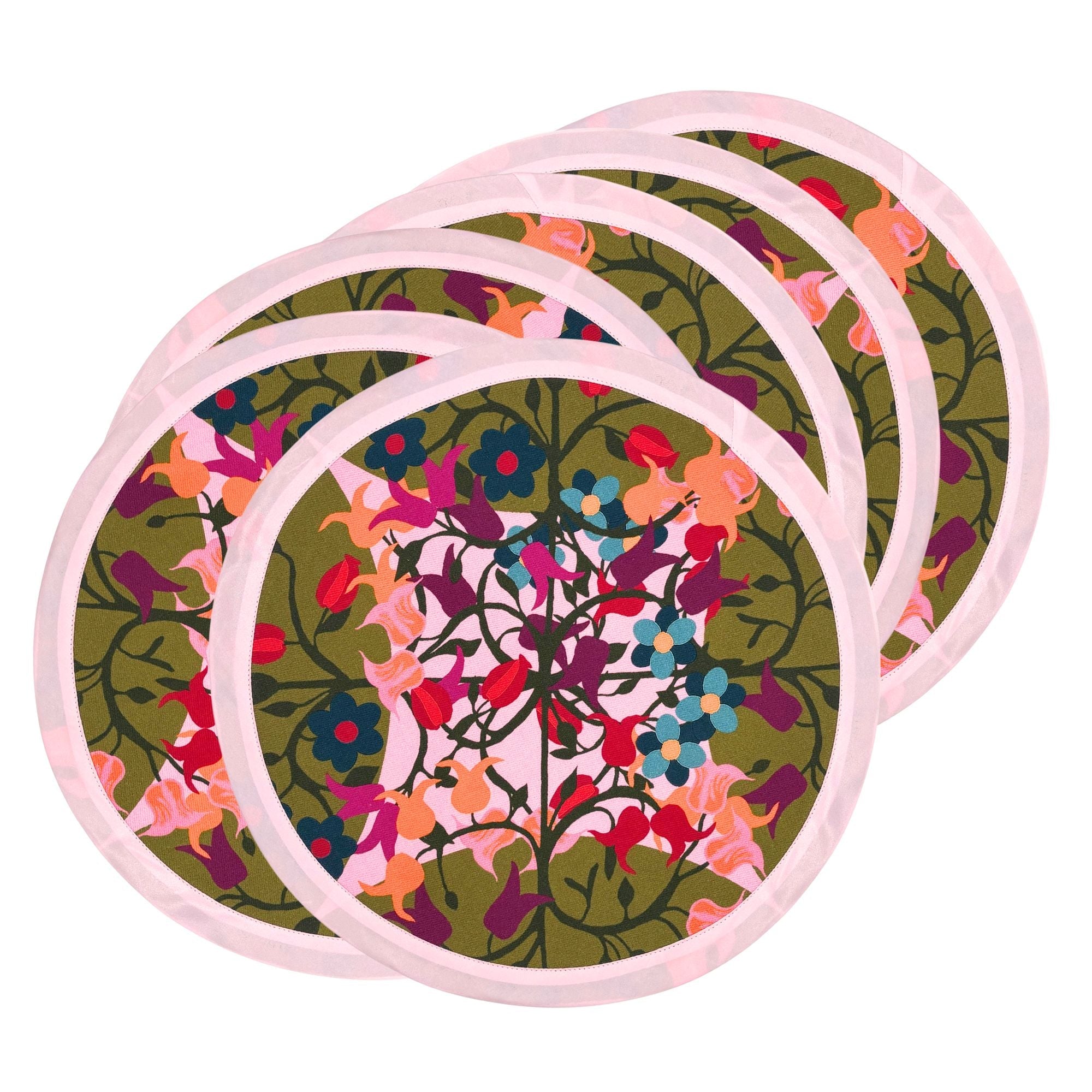 Round placemat with green and pink floral geometric print in organic cotton.