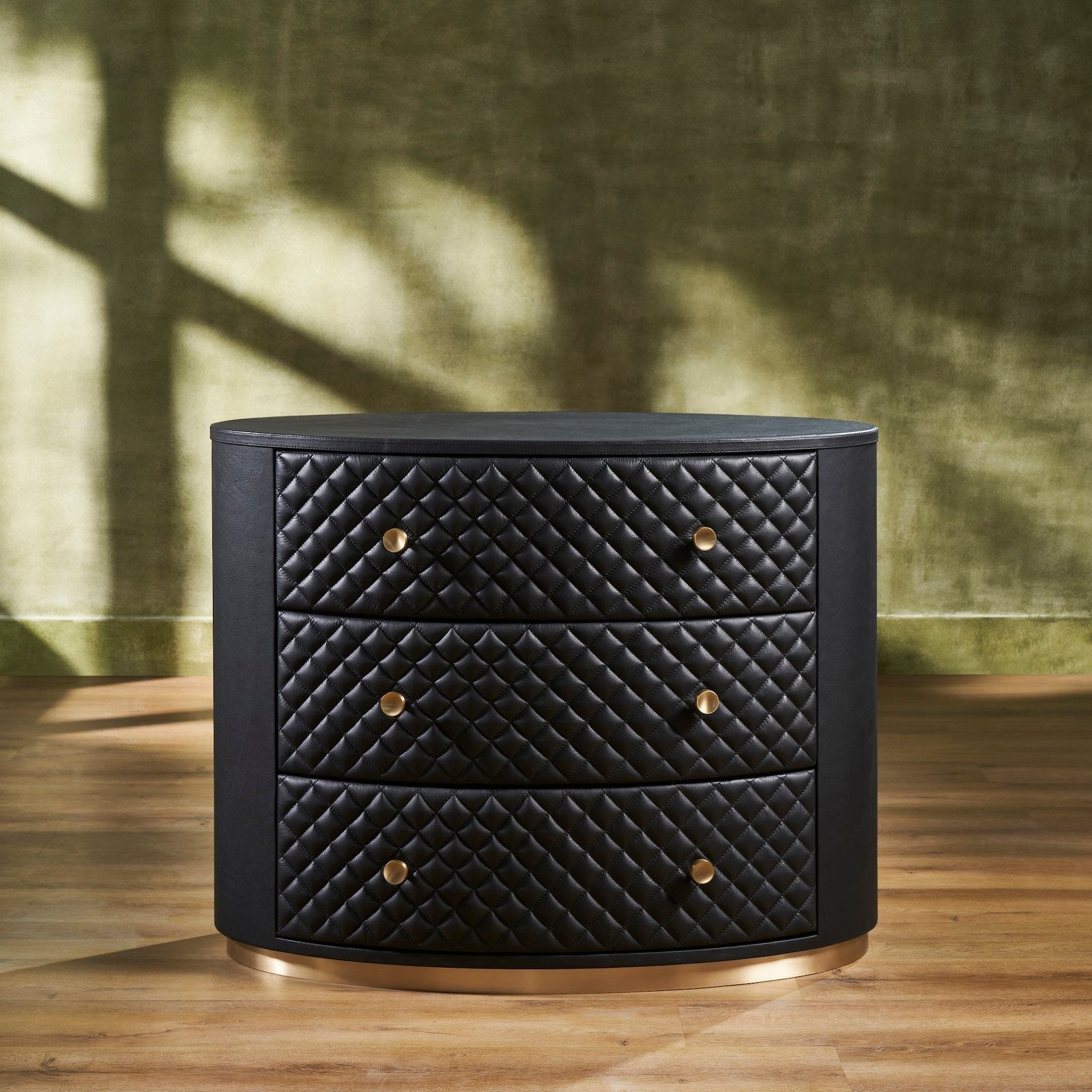 FN-5218-X_1|Stylish black quilted 3-drawer chest with radiant gold hardware and base. Modern, luxurious storage furniture.