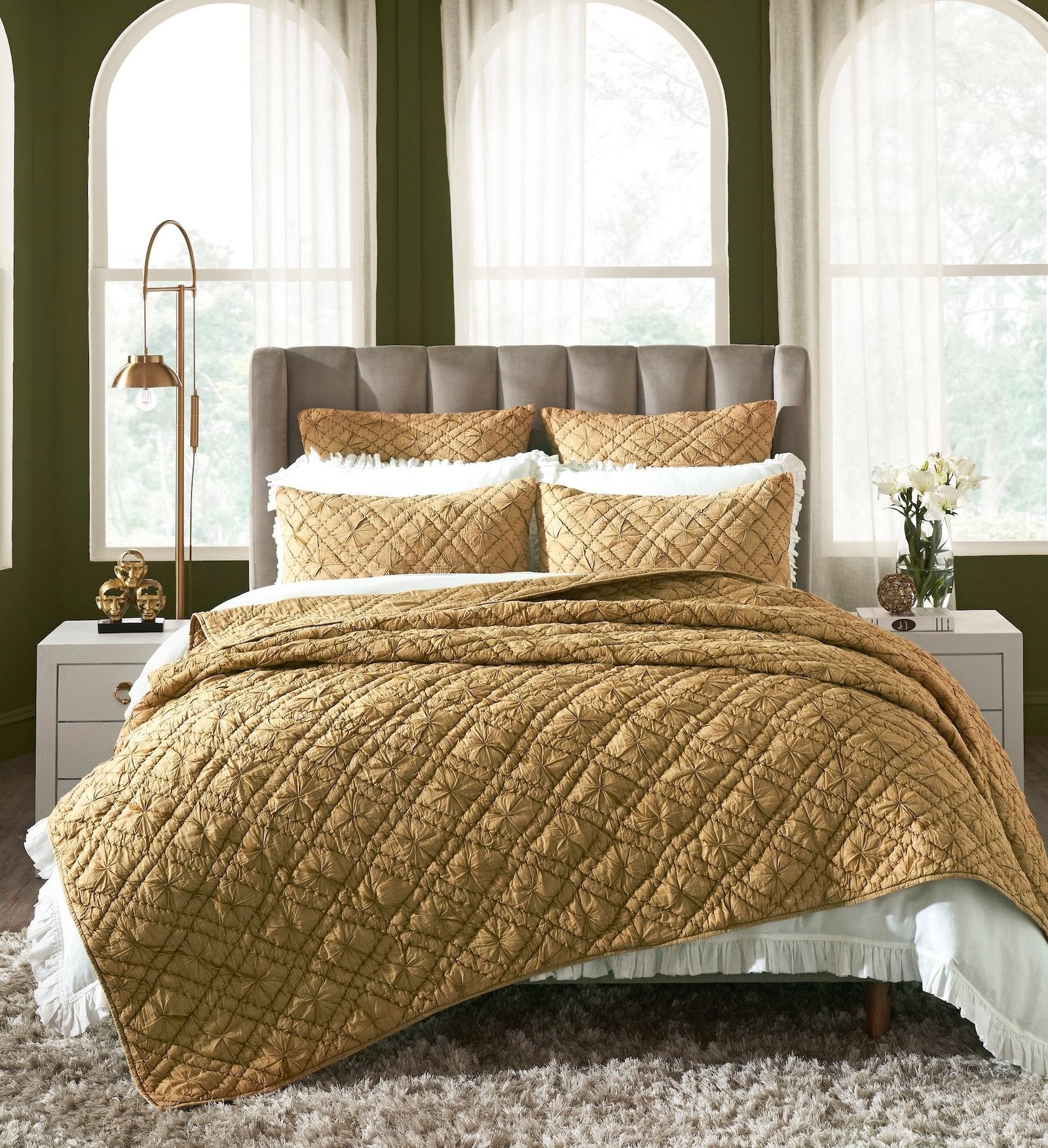 SS-364-X_1|Luxurious gold quilted bedding set with matching decorative pillows, adding opulence and warmth to a sophisticated bedroom.