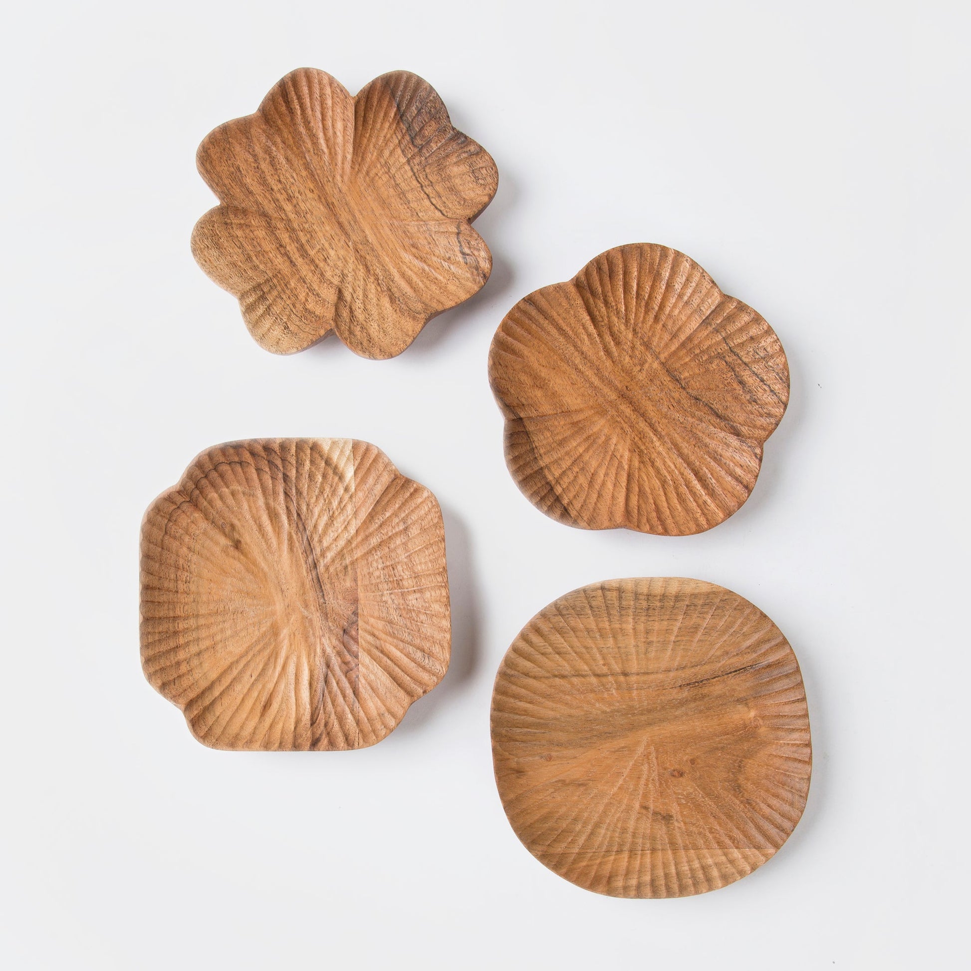 Close-up of hand-carved wood texture and natural grain on trinket tray
