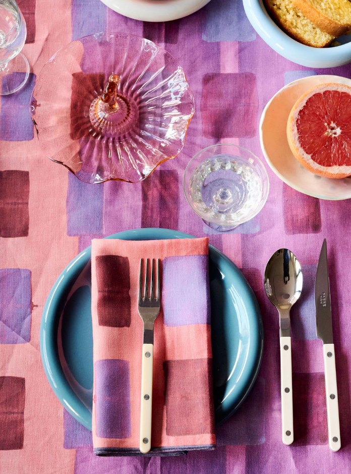 Pink Tapestry linen tablecloth styled on dining table with matching napkins - Goldie Home