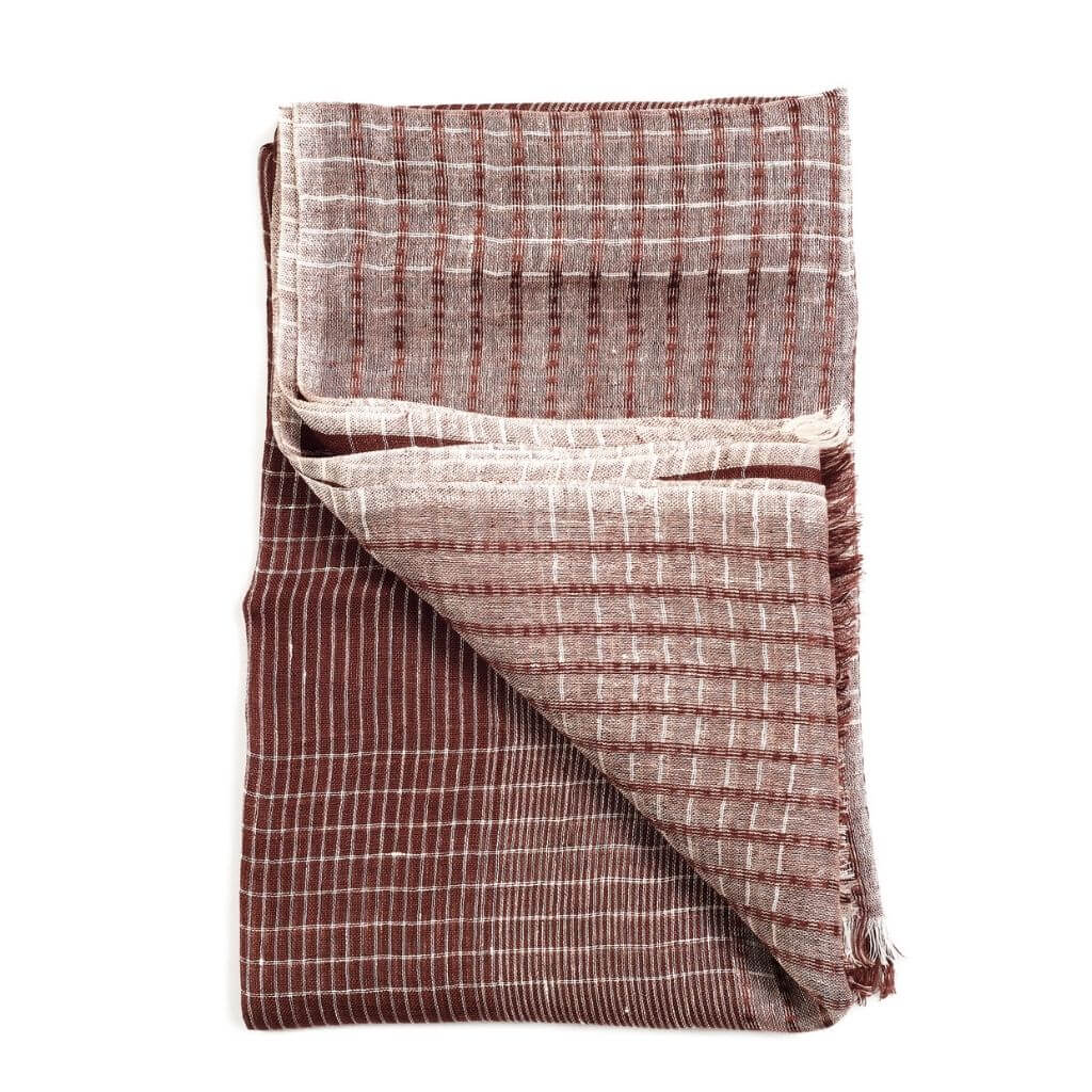 Auro Cinnabar Handwoven Earthy Rust Maroon Linen Scarf showcasing handwoven texture and unique pattern.