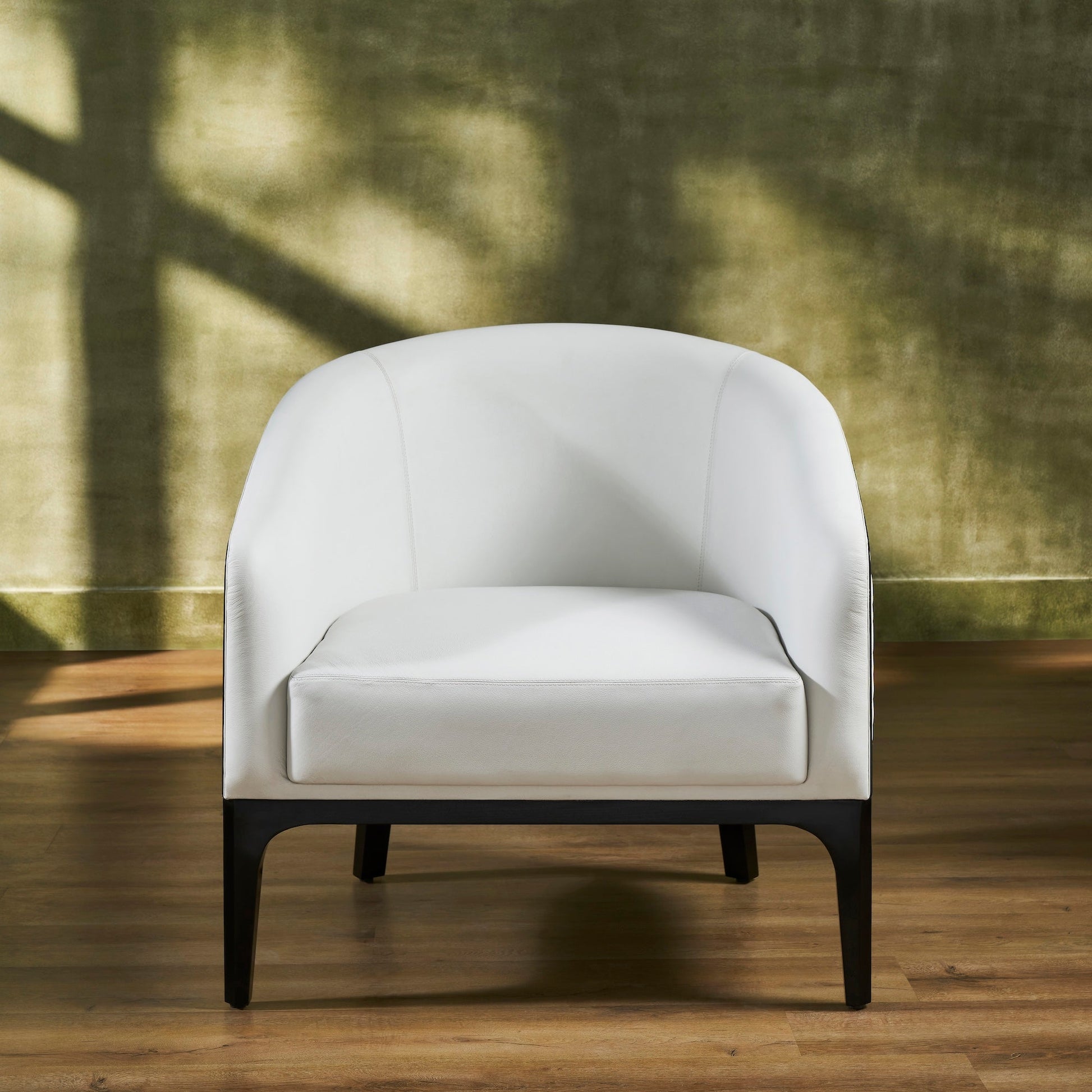 FN-5204-343329_4|Front view of a white leather armchair with dark wood frame, clean lines, and plush seating, modern luxury leather furniture.