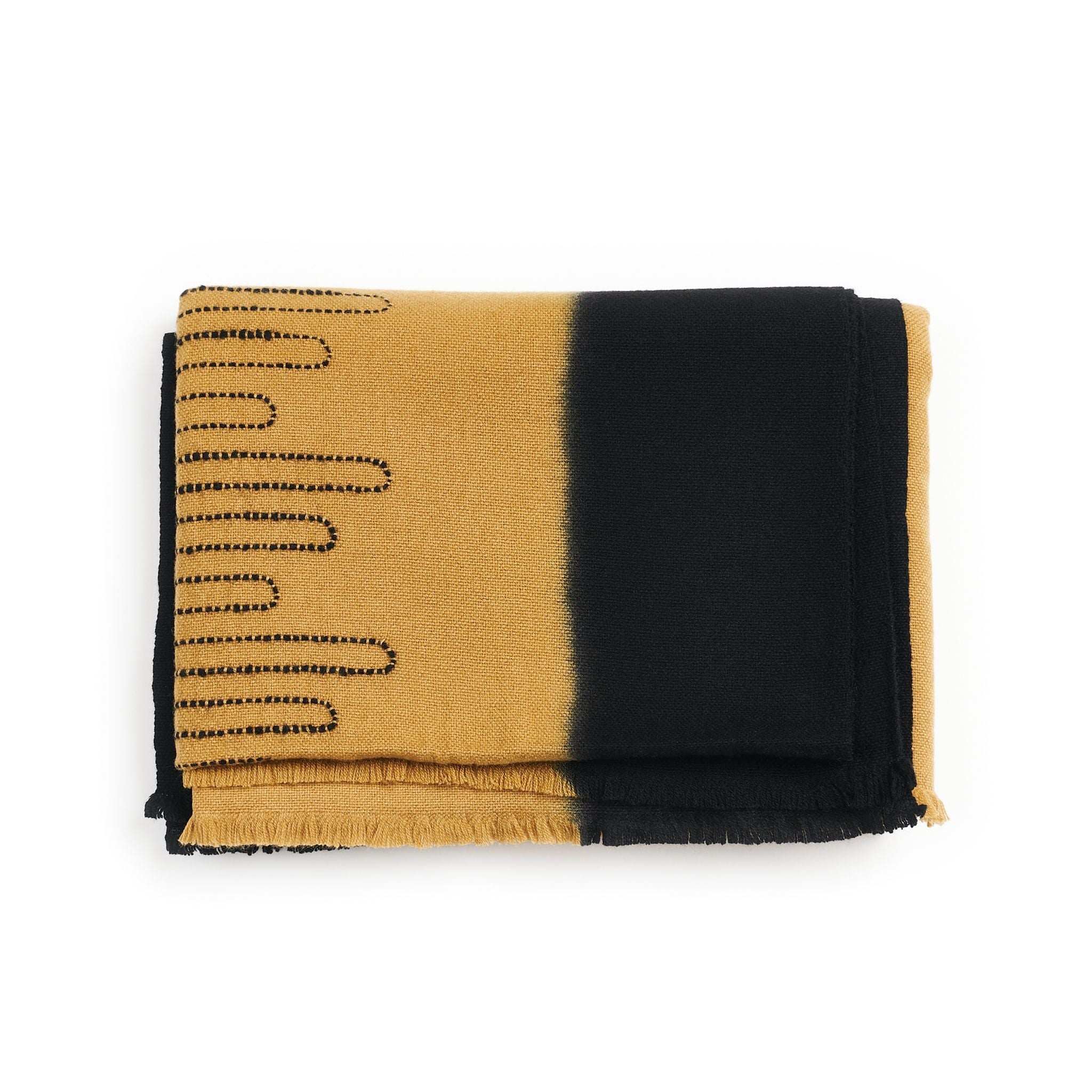 Handwoven Topaz Brown Myrtle Drift Merino Throw folded, featuring soft GOTS certified merino wool with contrasting designs.