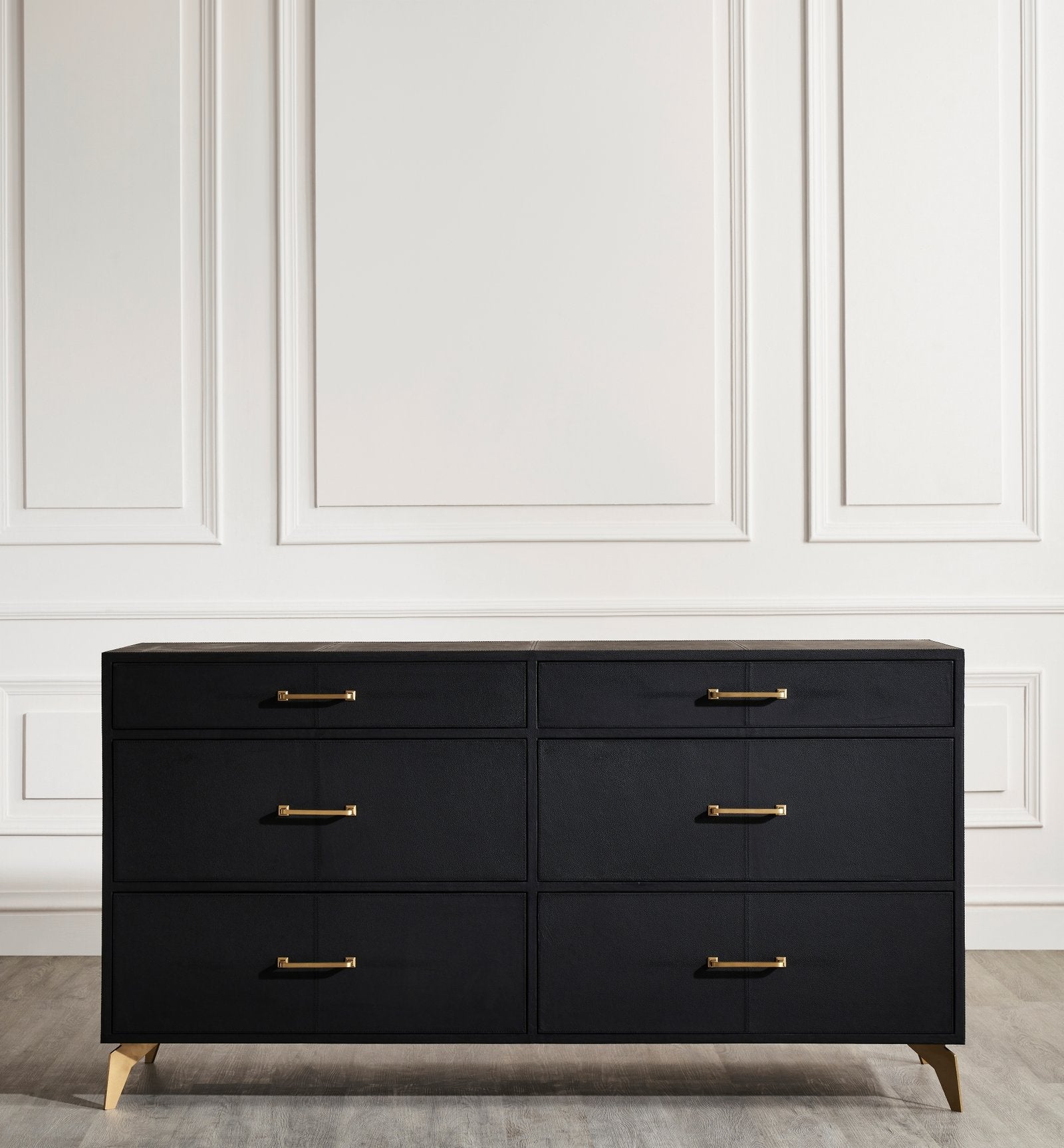FN-5200-642033_2|Modern black leather six-drawer dresser featuring chic gold pull handles and sturdy tapered legs for stylish organization.