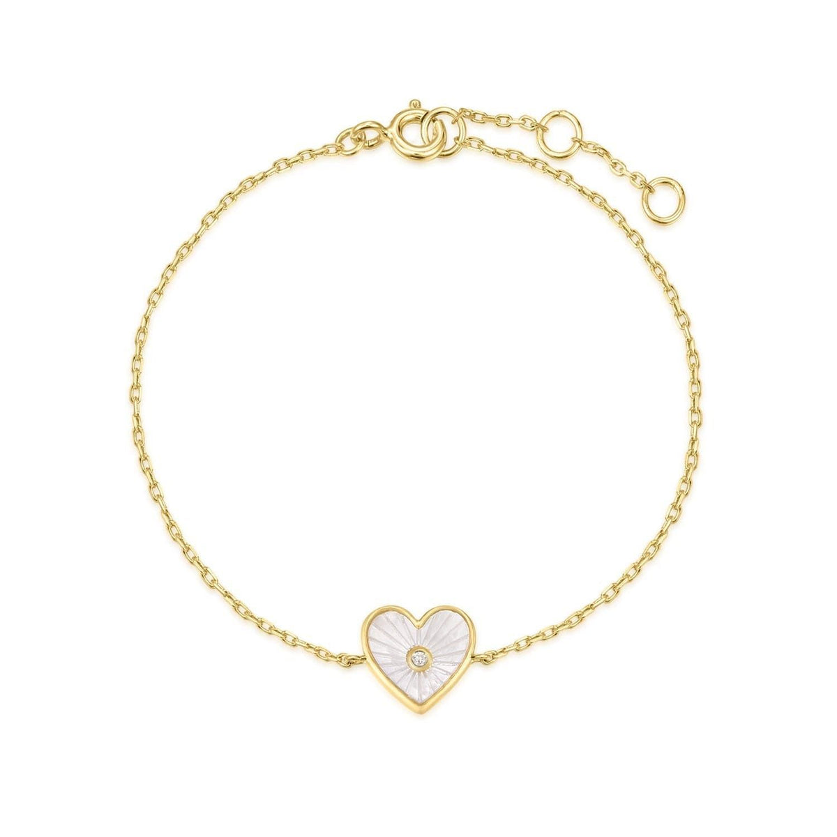 Gold chain bracelet with a mother-of-pearl heart and CZ center stone for a cute vibe