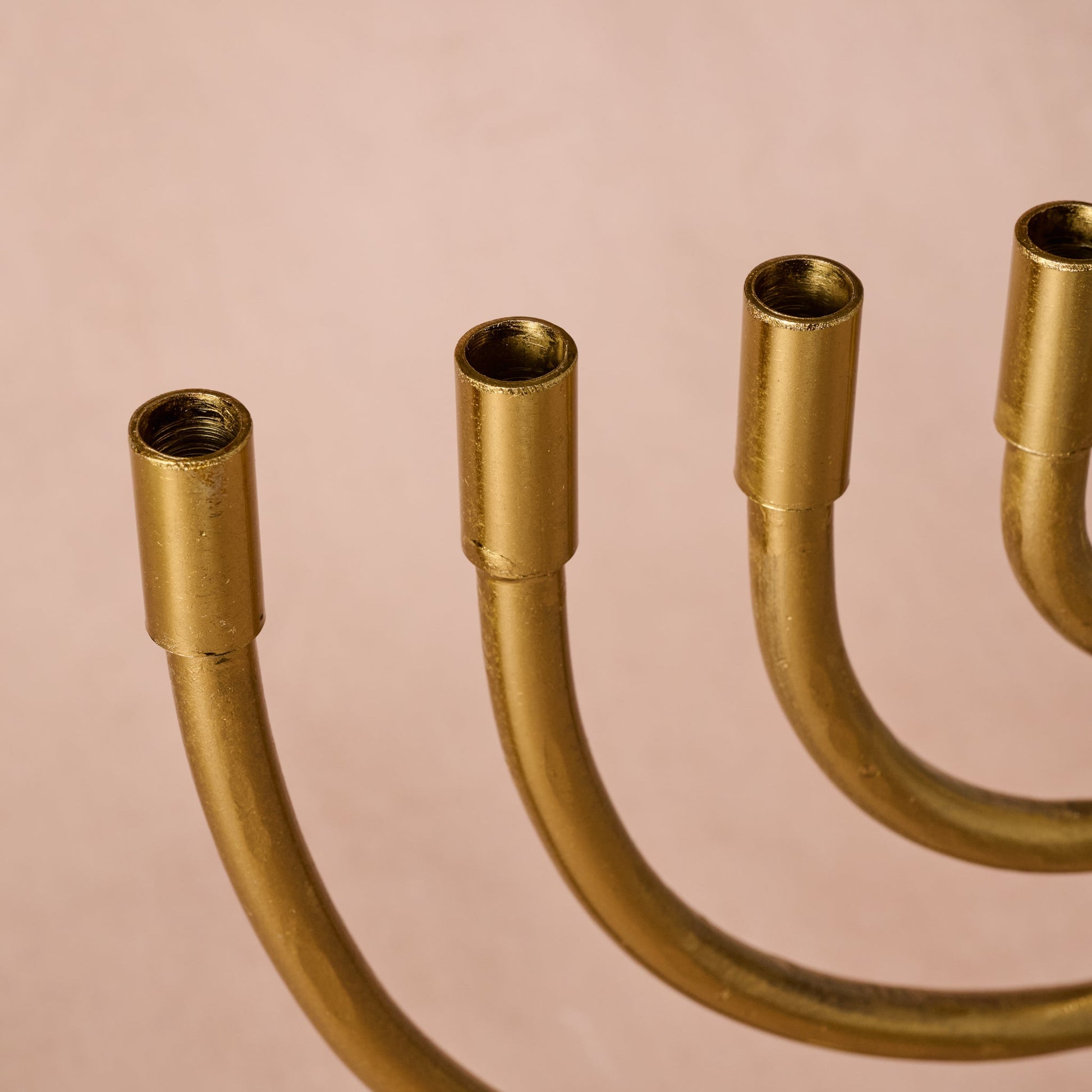 Jyoti Brass Horn Menorah - Ten Thousand Villages