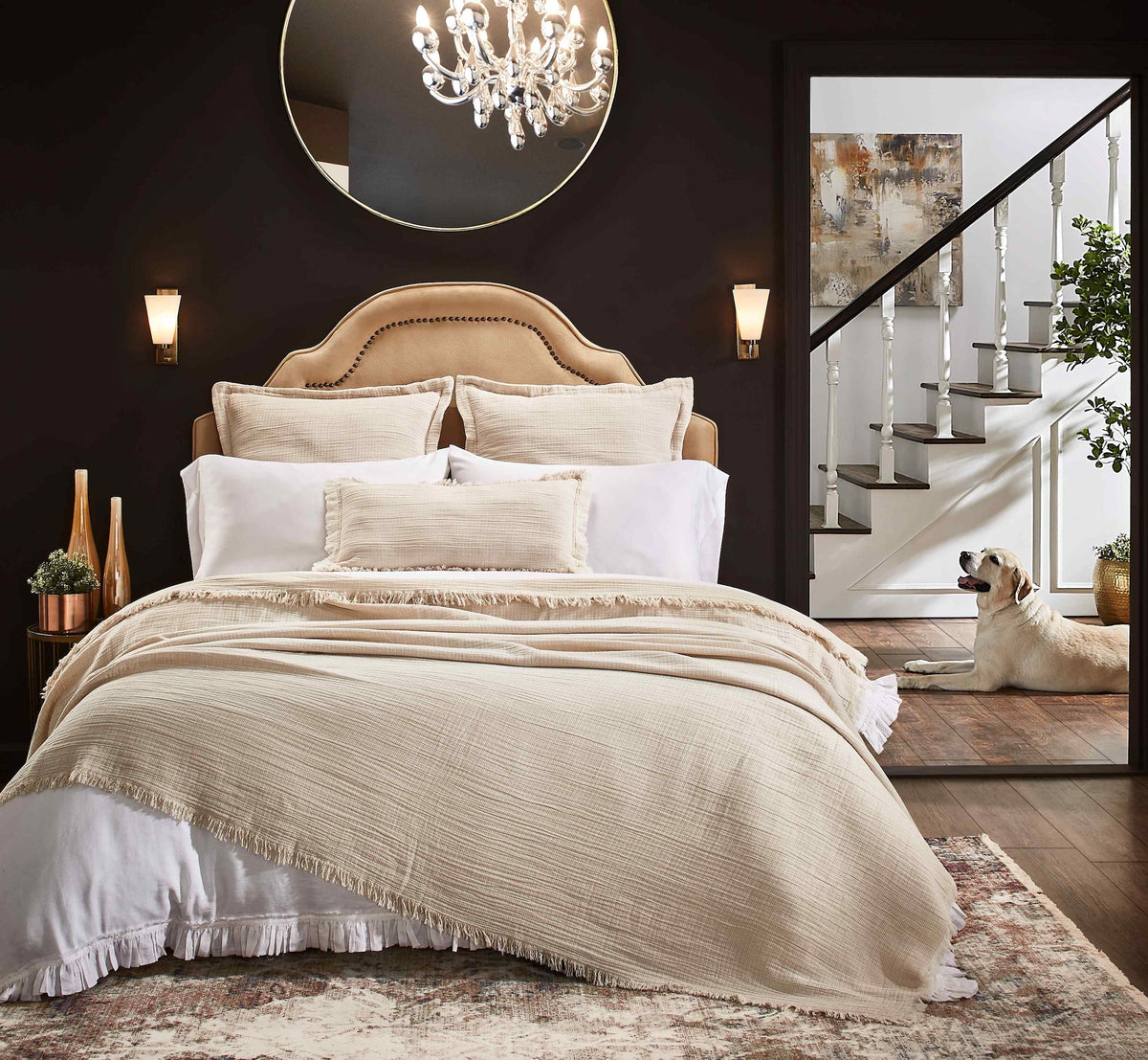 BT-115-9496_2|Luxurious cream textured cotton blanket with fringed edges draped on a bed, enhancing a stylish, cozy bedroom decor.