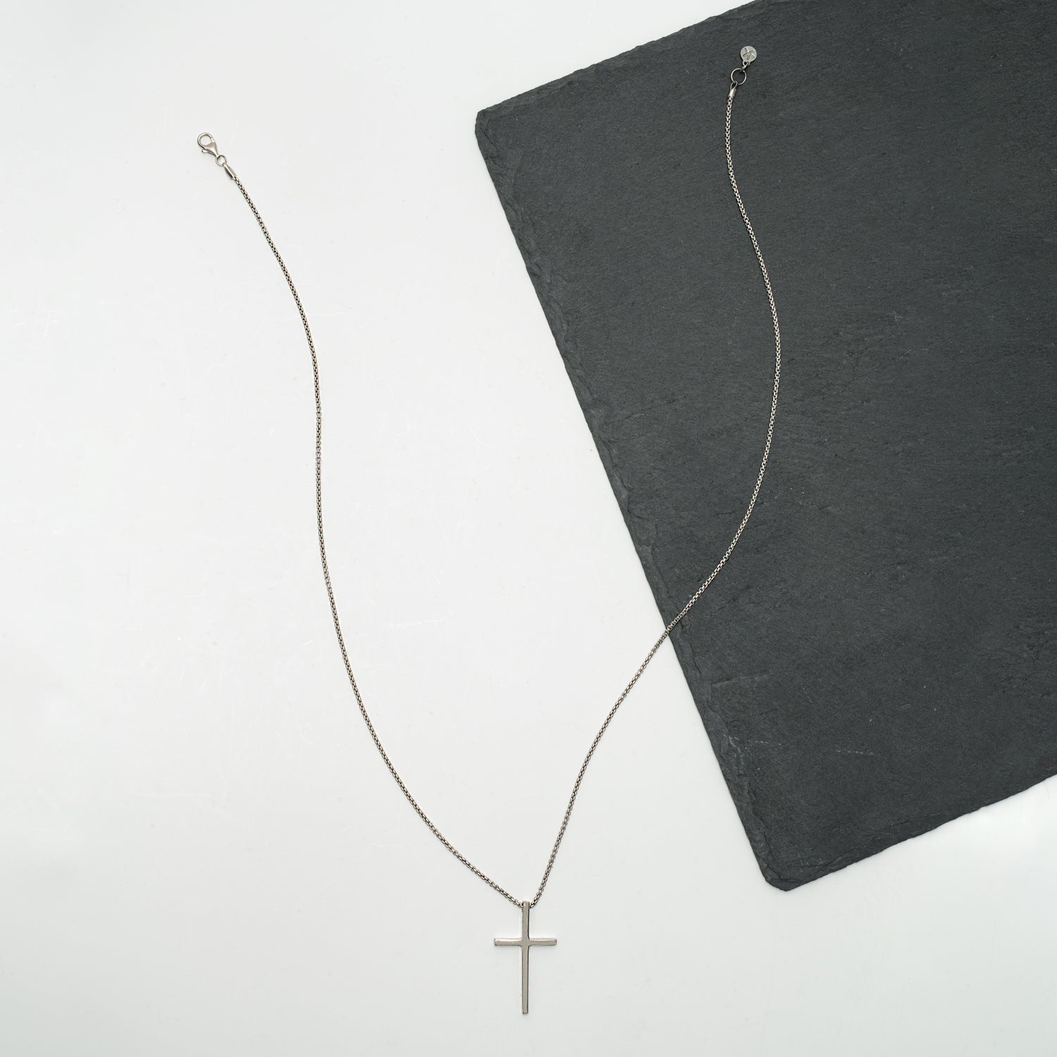 Full length photo of sterling silver cross necklace, silver chain, jewelry store, online gift shopping