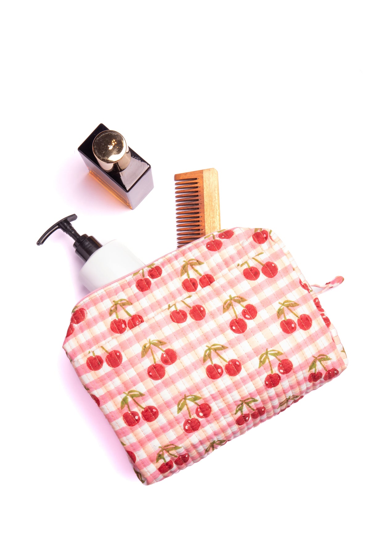 Red gingham cherry blockprint makeup bag with toiletries