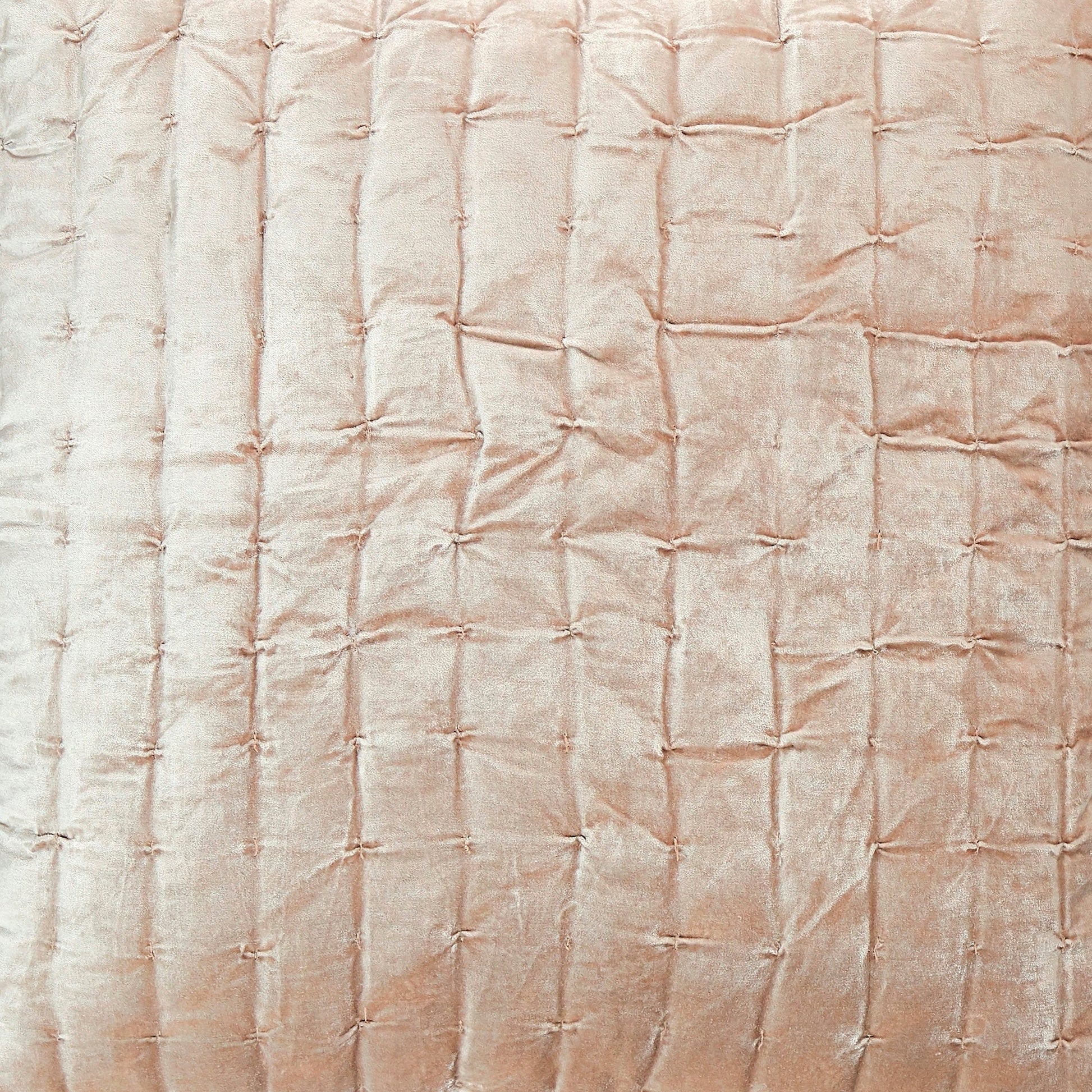 DE-312-3137-LOT1_2|Detailed view of a blush pink quilted velvet fabric, showcasing precise square stitching and rich, inviting texture.