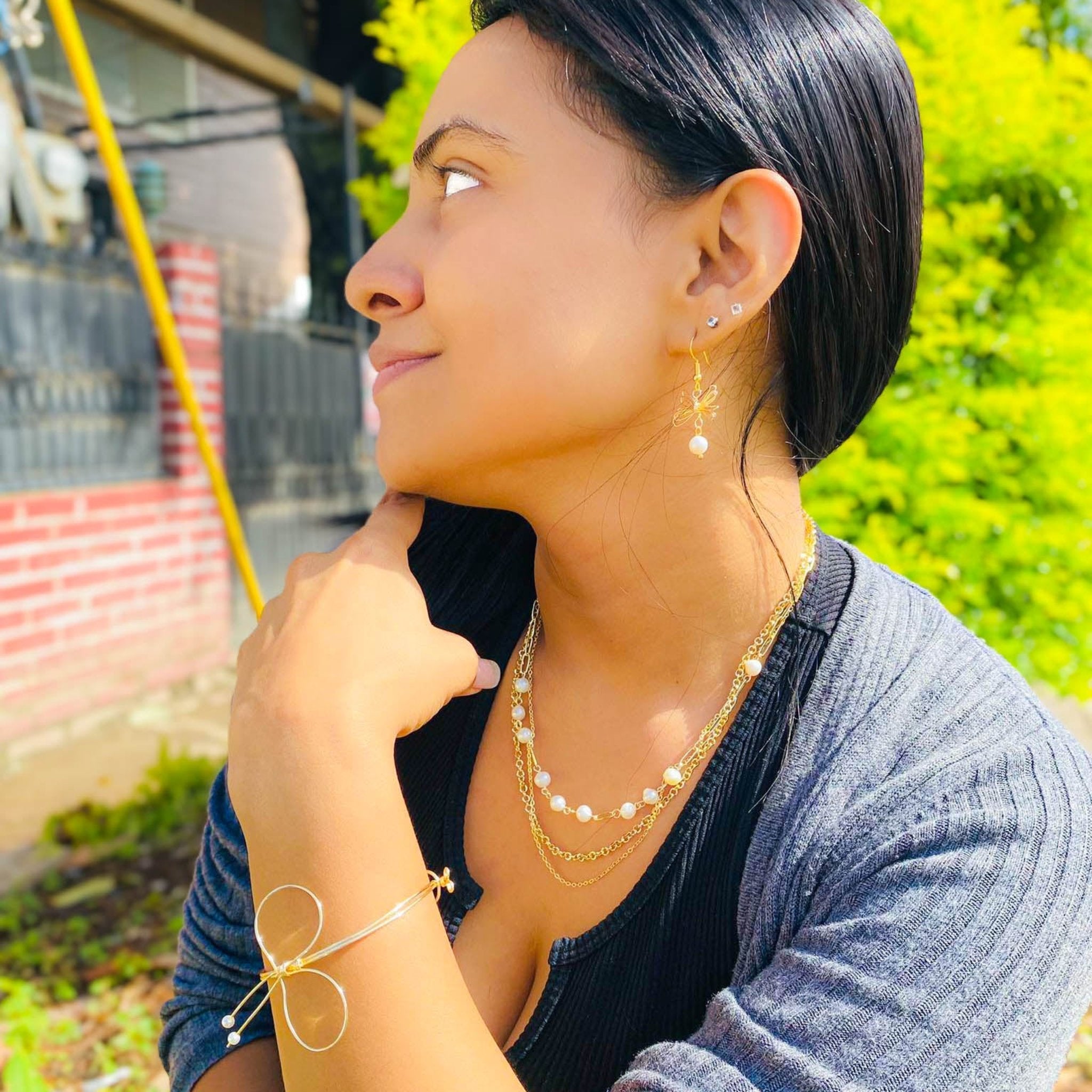 Gold pearl bow Artisan jewelry