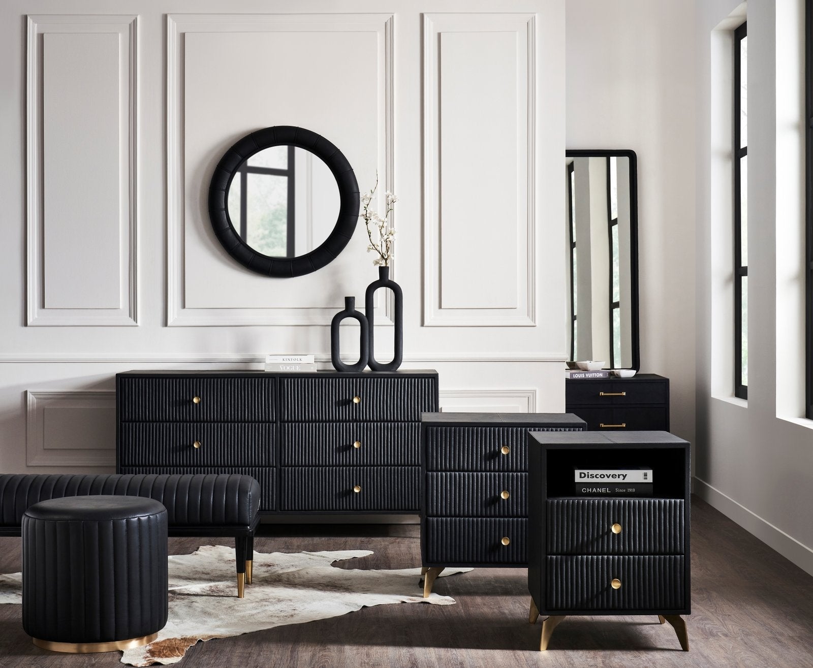 FN-5202-X_2|Elegant black fluted dresser and nightstands with gold accents, accompanied by a matching bench and stool in a modern bedroom.