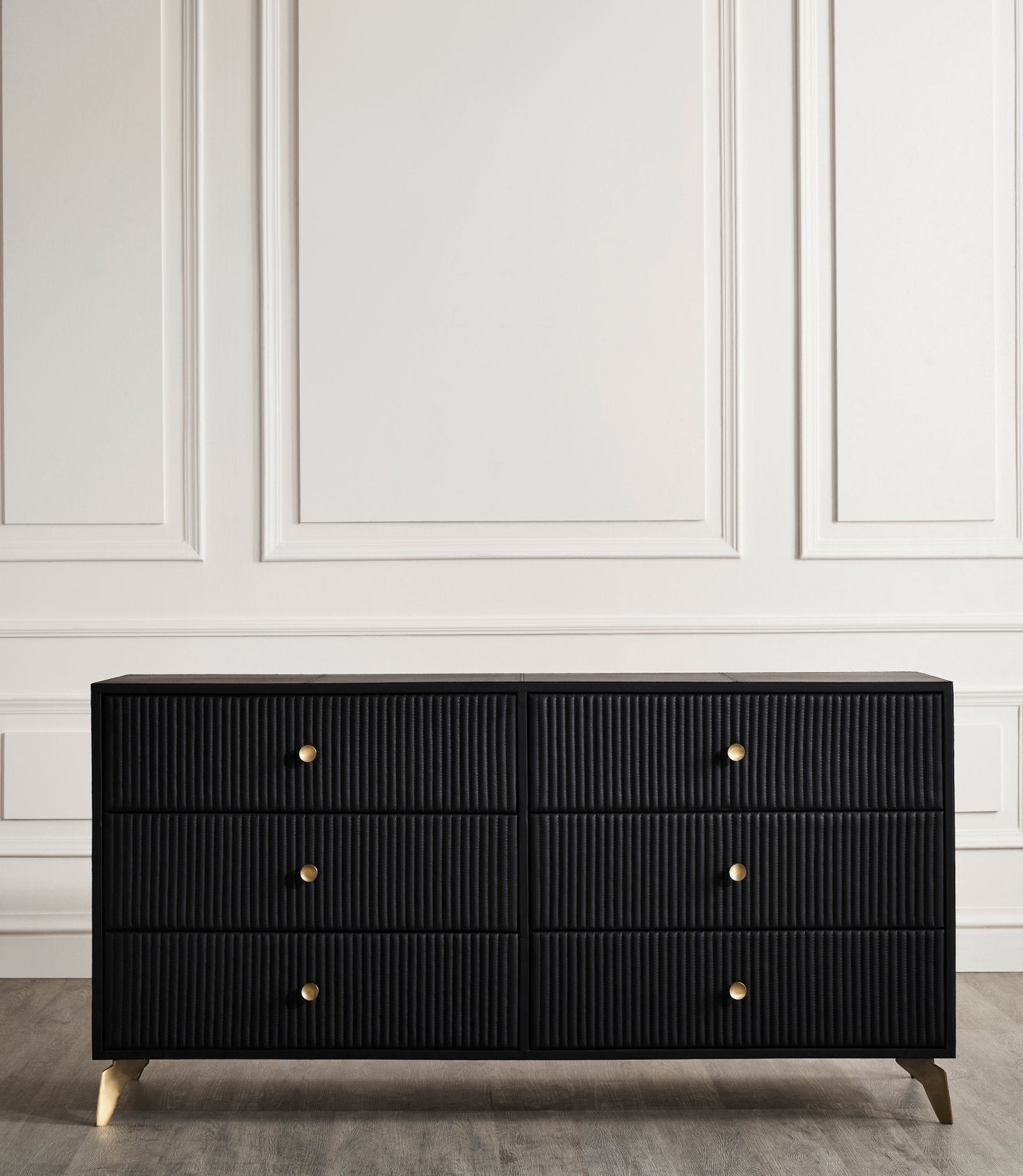 FN-5202-642033_3|Stylish black leather-clad dresser with unique channel-tufted drawers and chic gold hardware, perfect for luxurious bedrooms.
