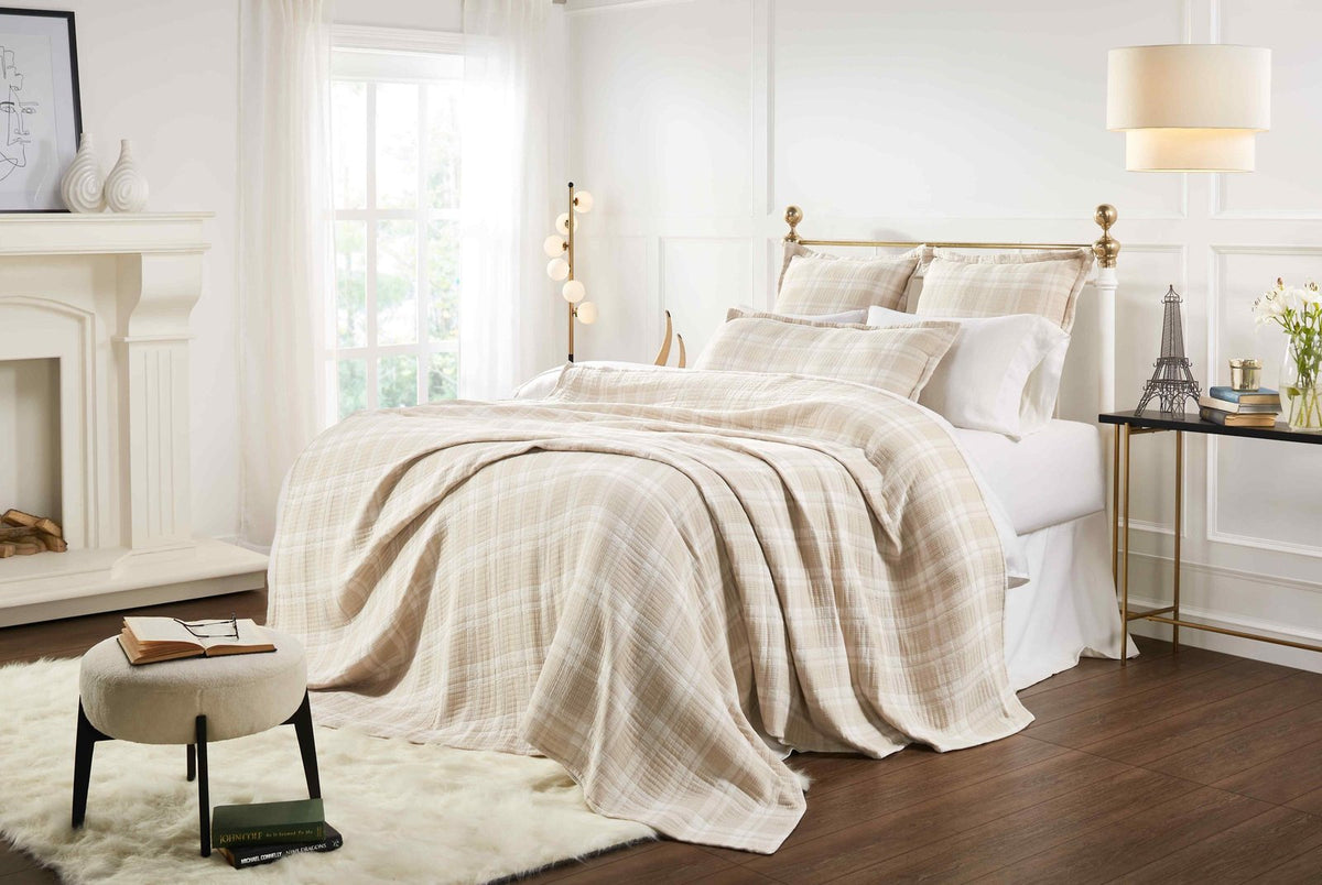 BT-118-9496_5|Soft beige and white plaid patterned cotton quilt blanket draped elegantly over a bed, offering warmth and classic style.