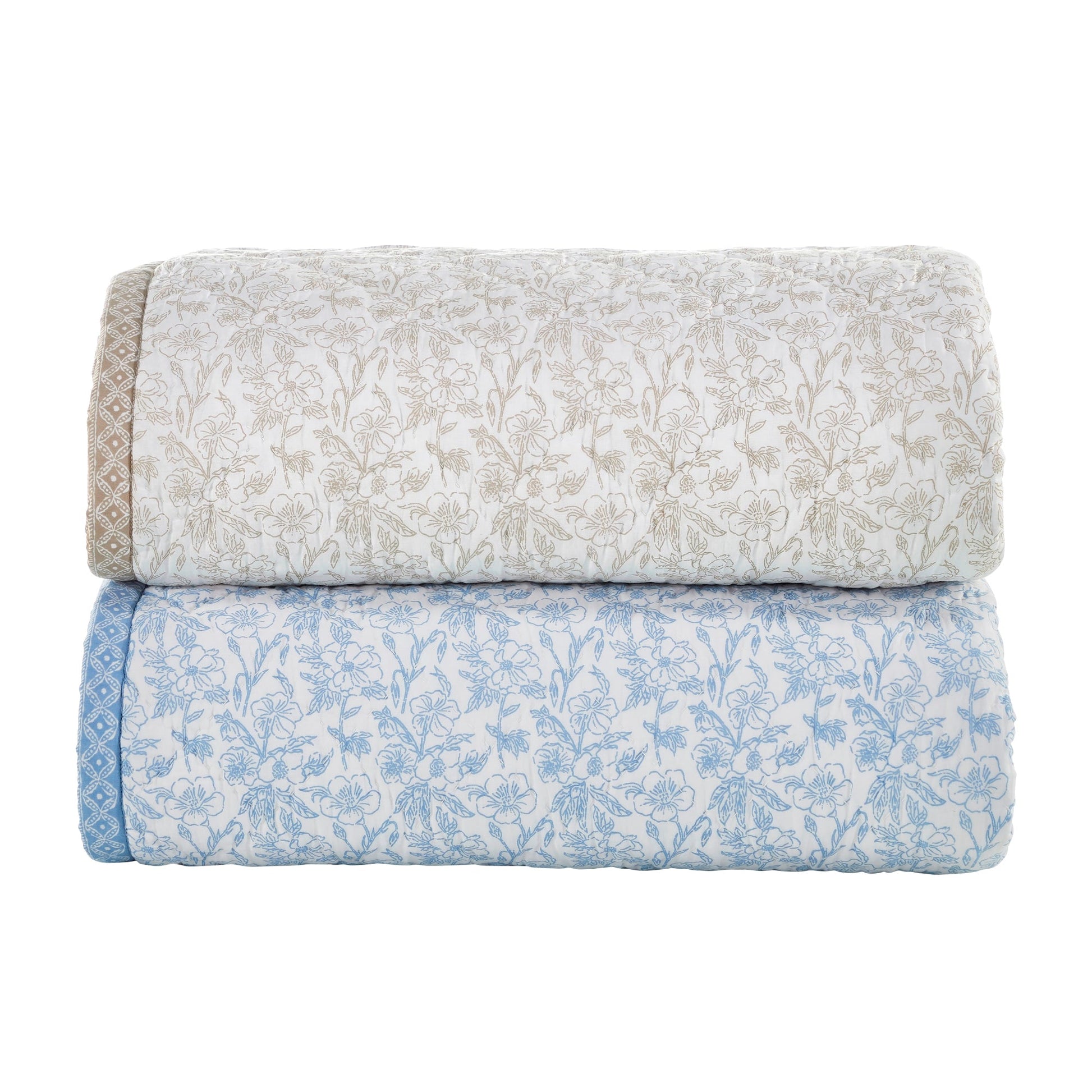 QT-346-11096_8|Stacked beige and blue floral print quilts, neatly rolled. These soft, patterned bedspreads offer comfort and style for any bedroom decor.