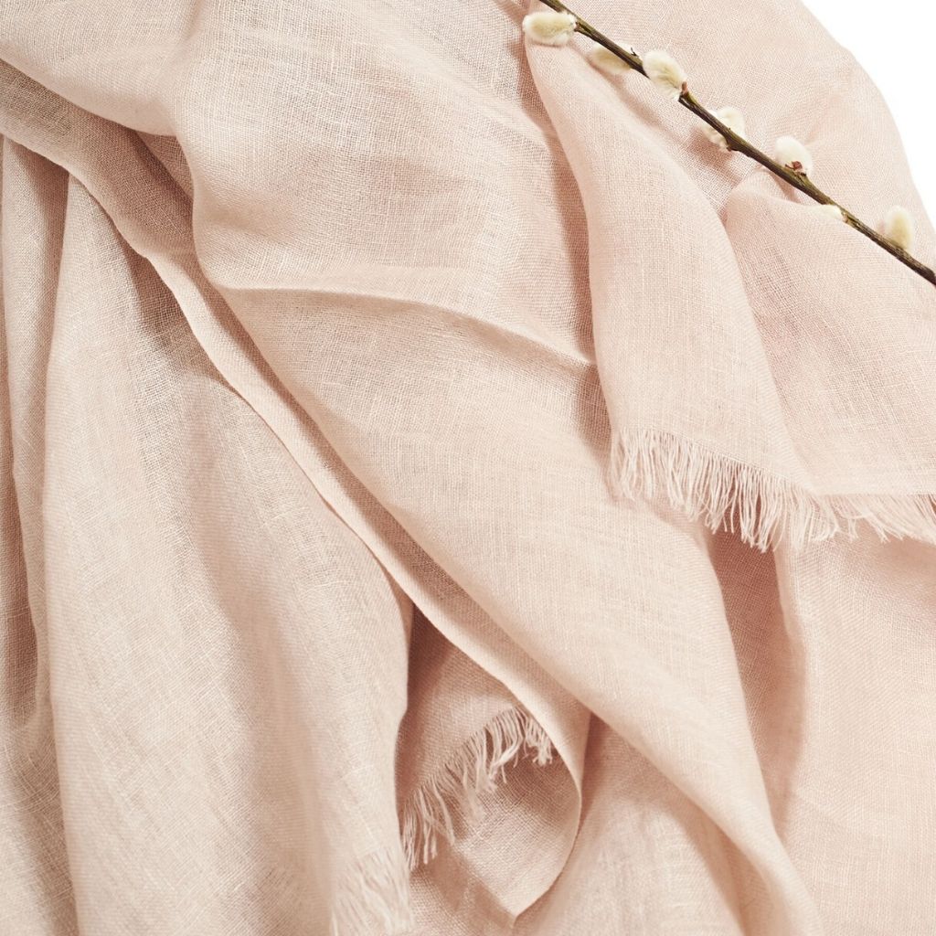 Oat Beige Neutral Hand Woven Soft Linen Silk Scarf draped elegantly with soft texture and fringed edges.