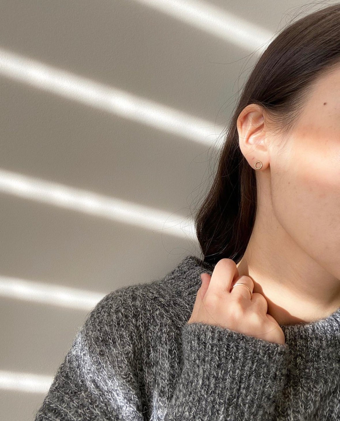 Model wearing Margo Petite Circle Studs, gold fill earrings styled with a casual outfit, 14k Gold Filled Open Circle Stud Earrings - Gold Filled Round Earrings, Minimalist Earrings, Dot Stud Earrings, Everyday Jewelry, Sheena Marshall Jewelry, Denver, Colorado