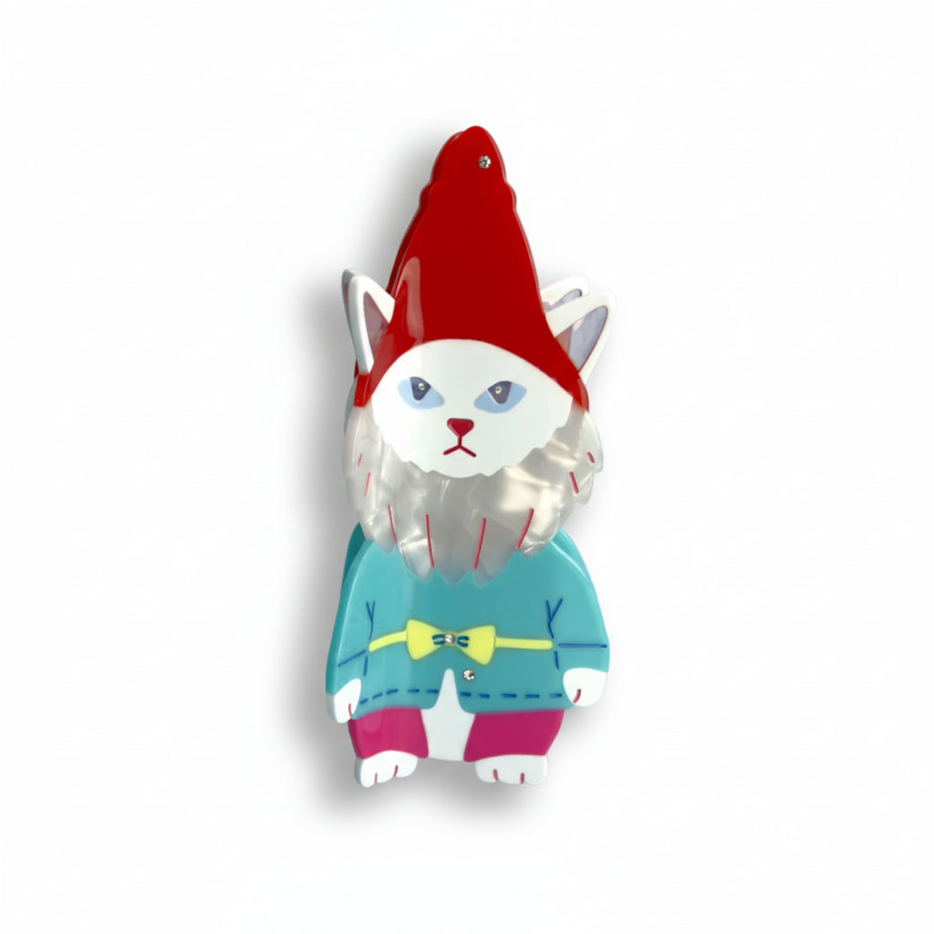 Cat garden gnome From Lawn Ornament to Hair claw Accessory World Traveler in red, blue and pink. Handmade on cellulose acetate, with splice technique, exquisite miniature details and crystals, that are tied directly to its value and make them unique and special. 