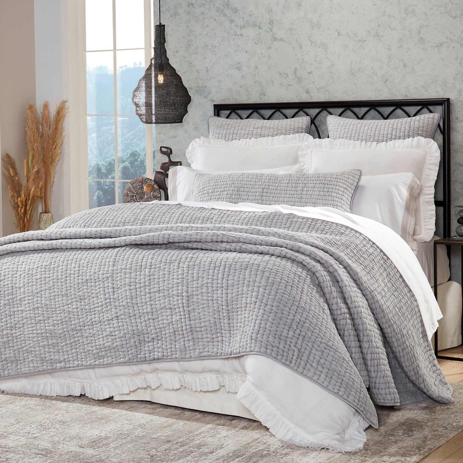 QT-344-11096_1|Light grey textured quilted bedspread creates a serene bedroom ambiance. Soft, comfortable, and stylish for relaxation.
