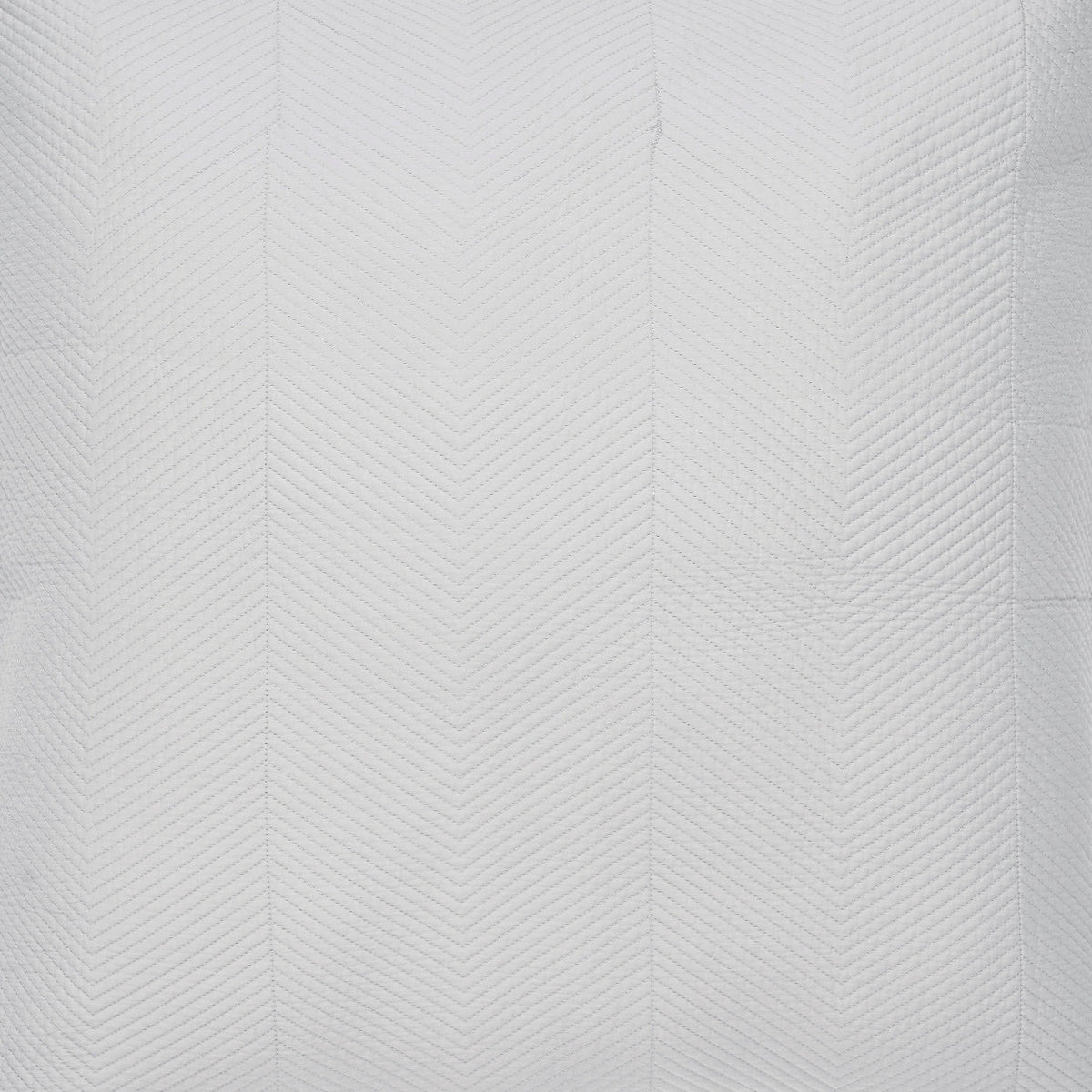 CL-172-11096_10|Close-up of a luxurious light grey quilted coverlet, highlighting its intricate herringbone pattern and quality fabric.