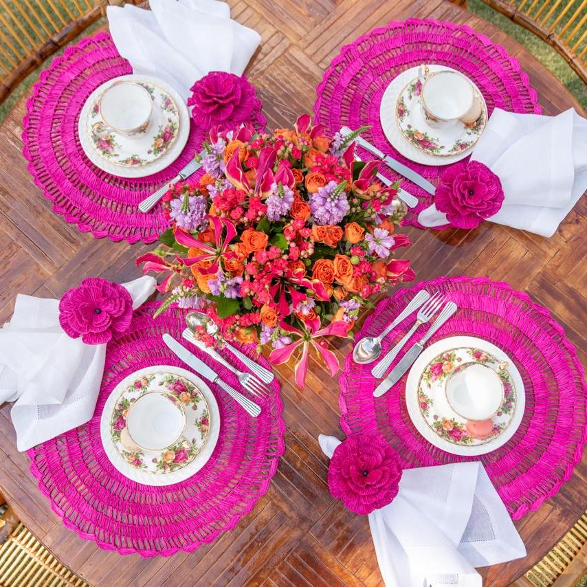 Buriti straw placemat handwoven from natural Brazilian palm fiber in pink by Talah Home