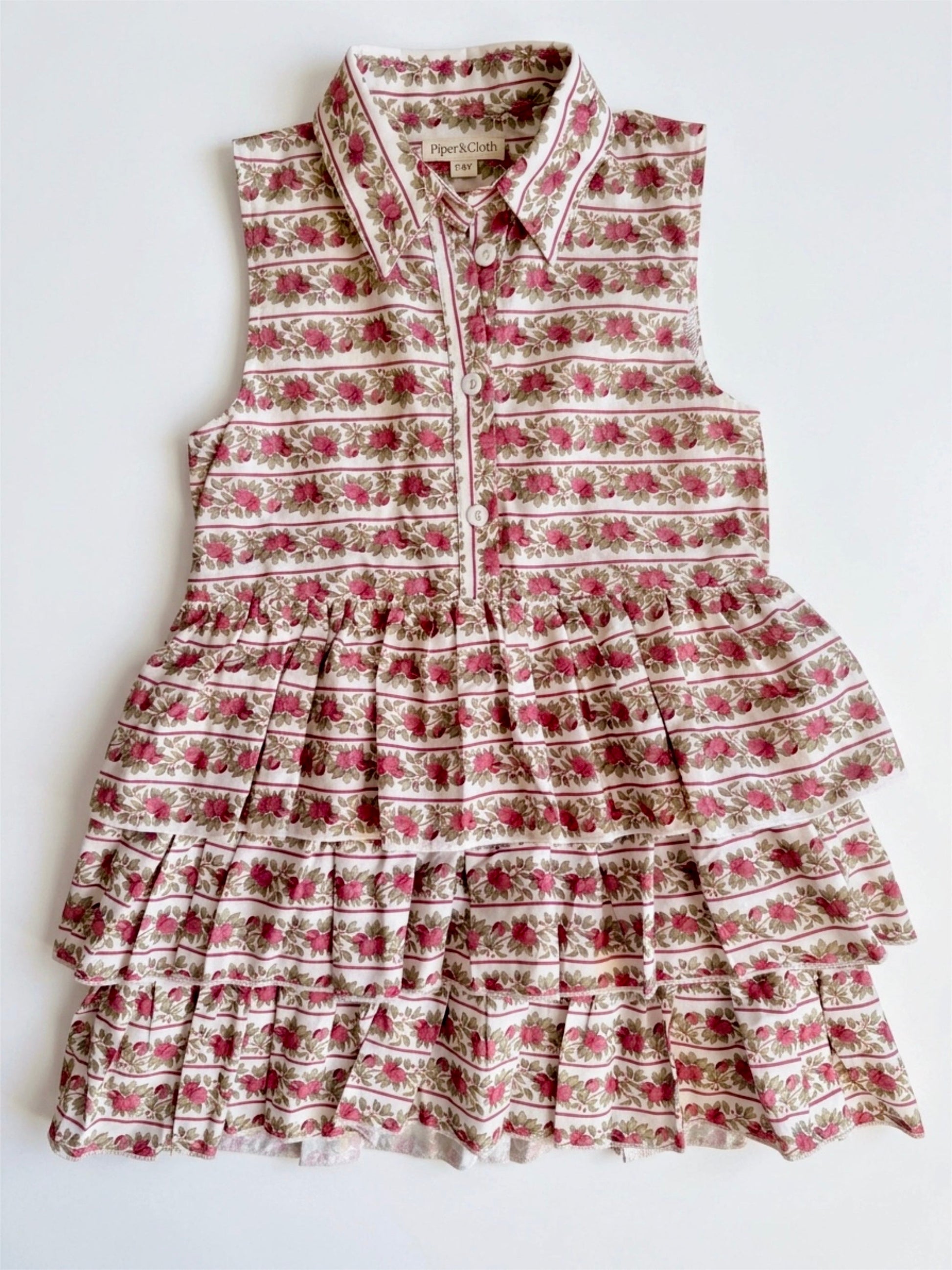 Floral tiered dress on a white background