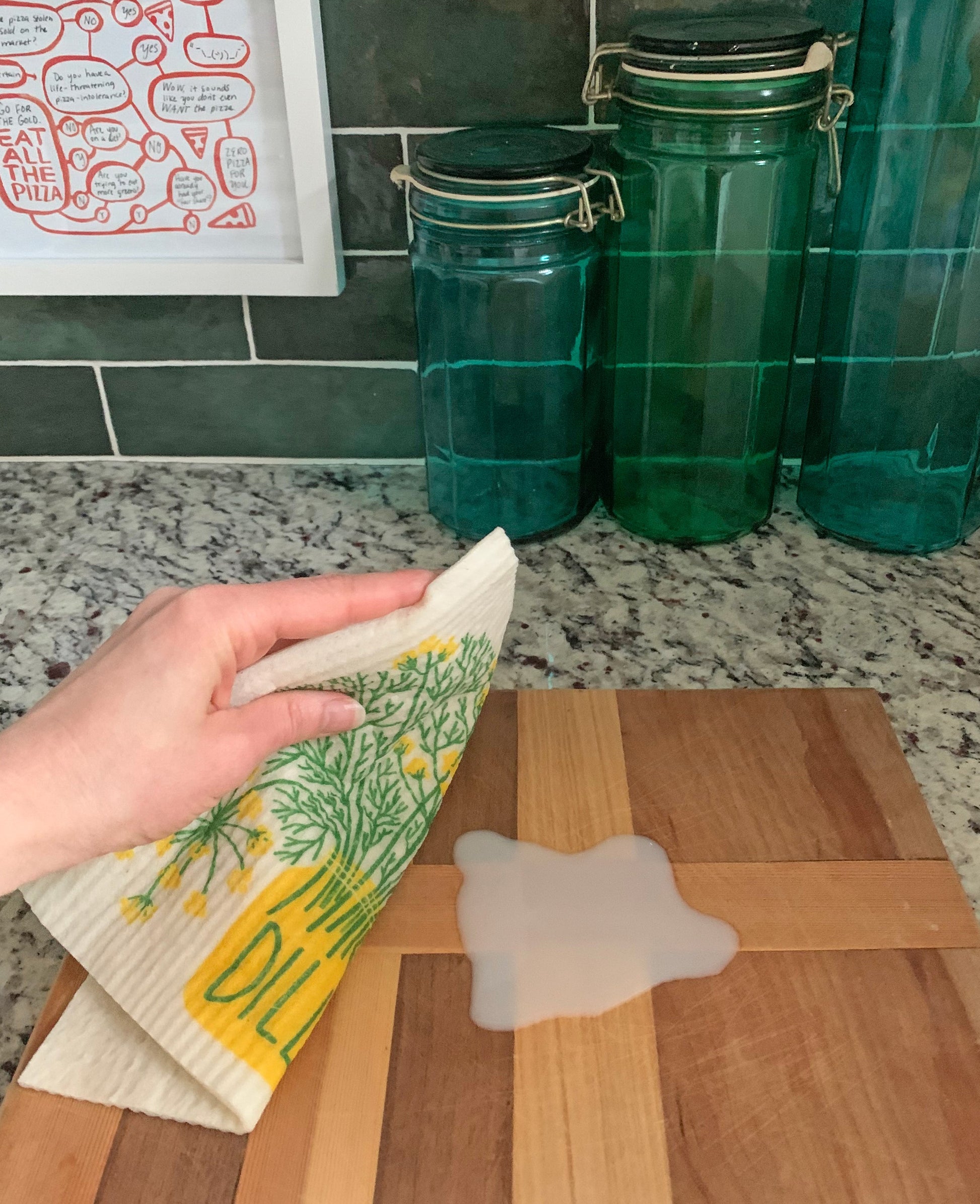 Back of matching dish towel and sponge cloth set with dill design